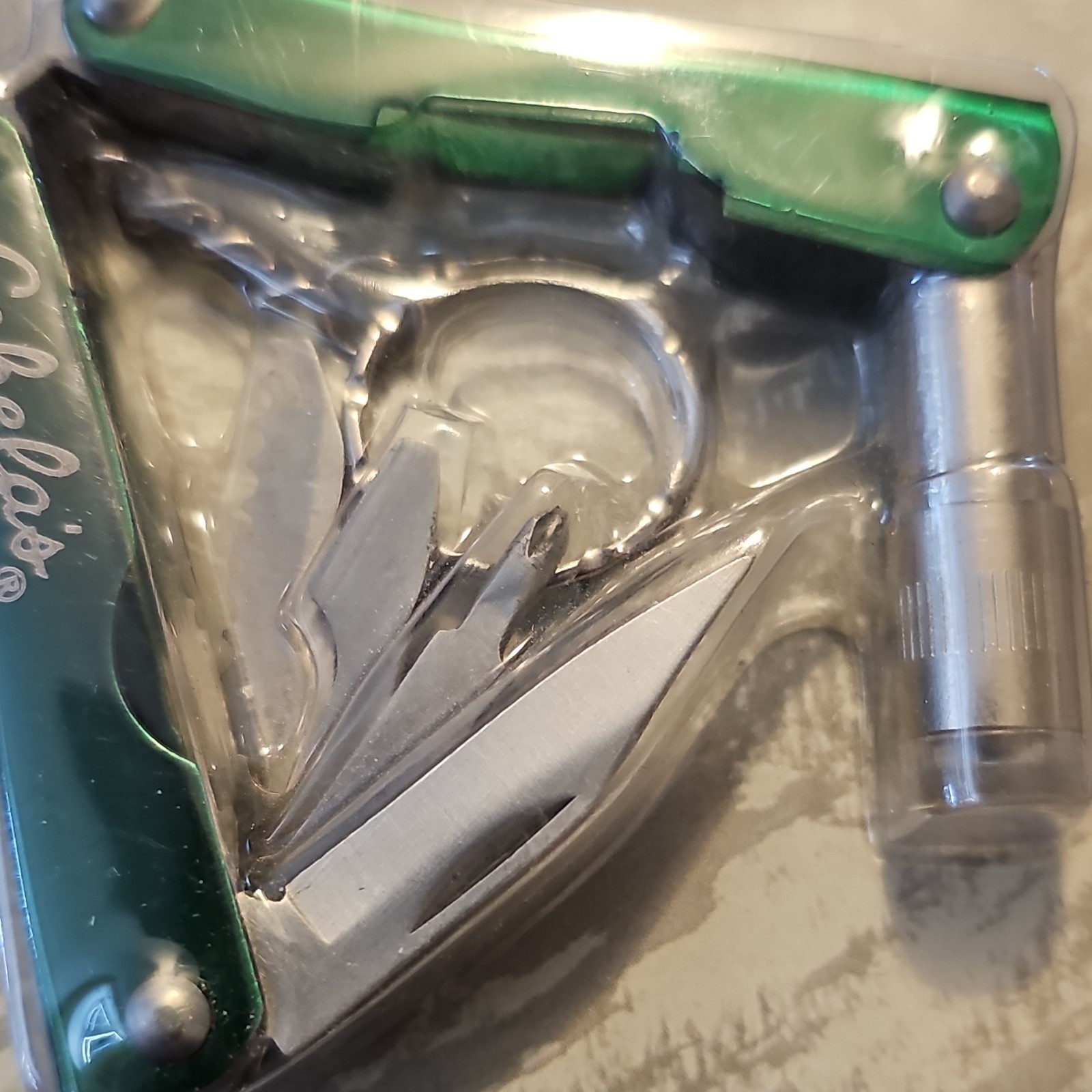 Cabeĺas Mini Multi Tool With LED Light