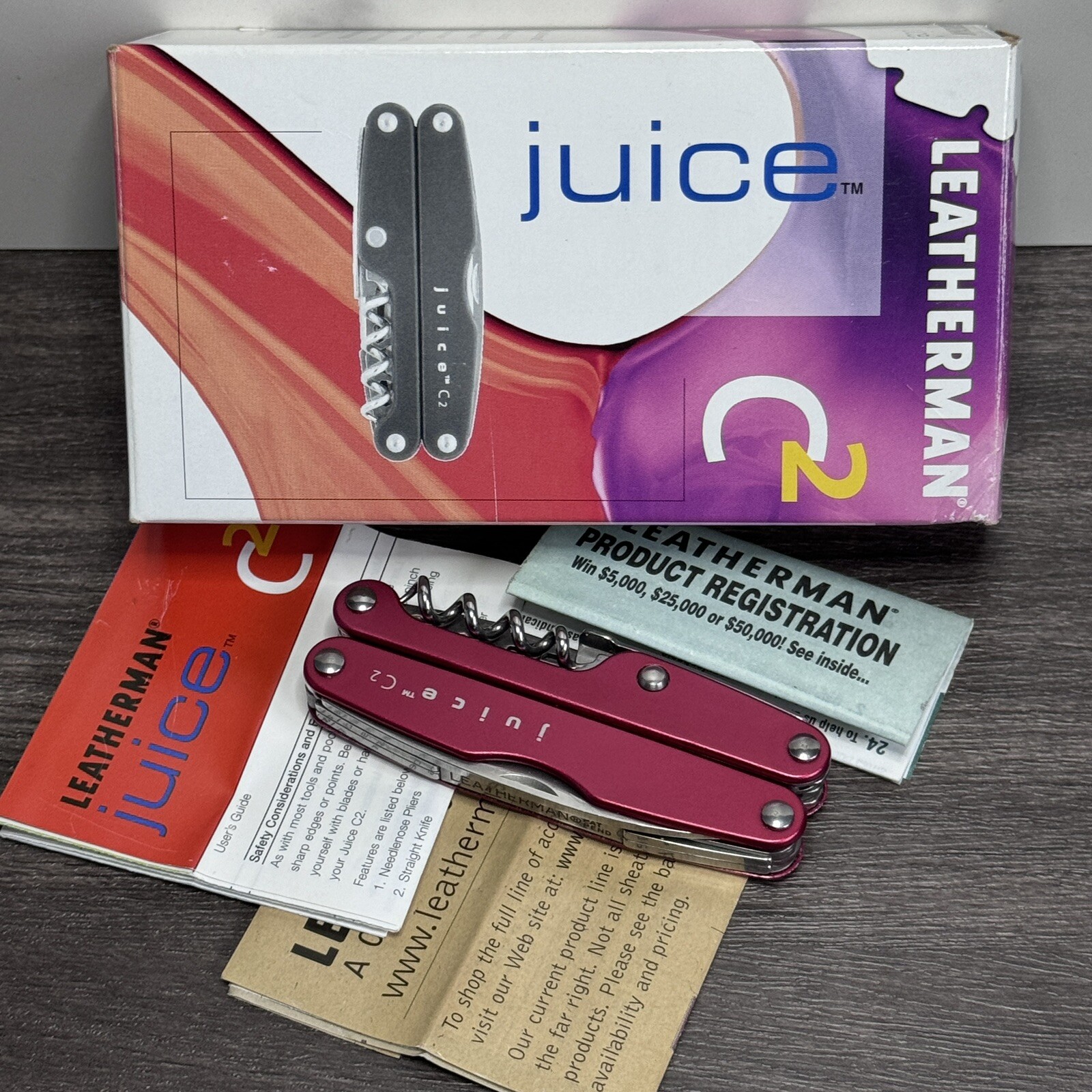 TWO Leatherman Juice C2 Red multitools. TM variants. Discontinued