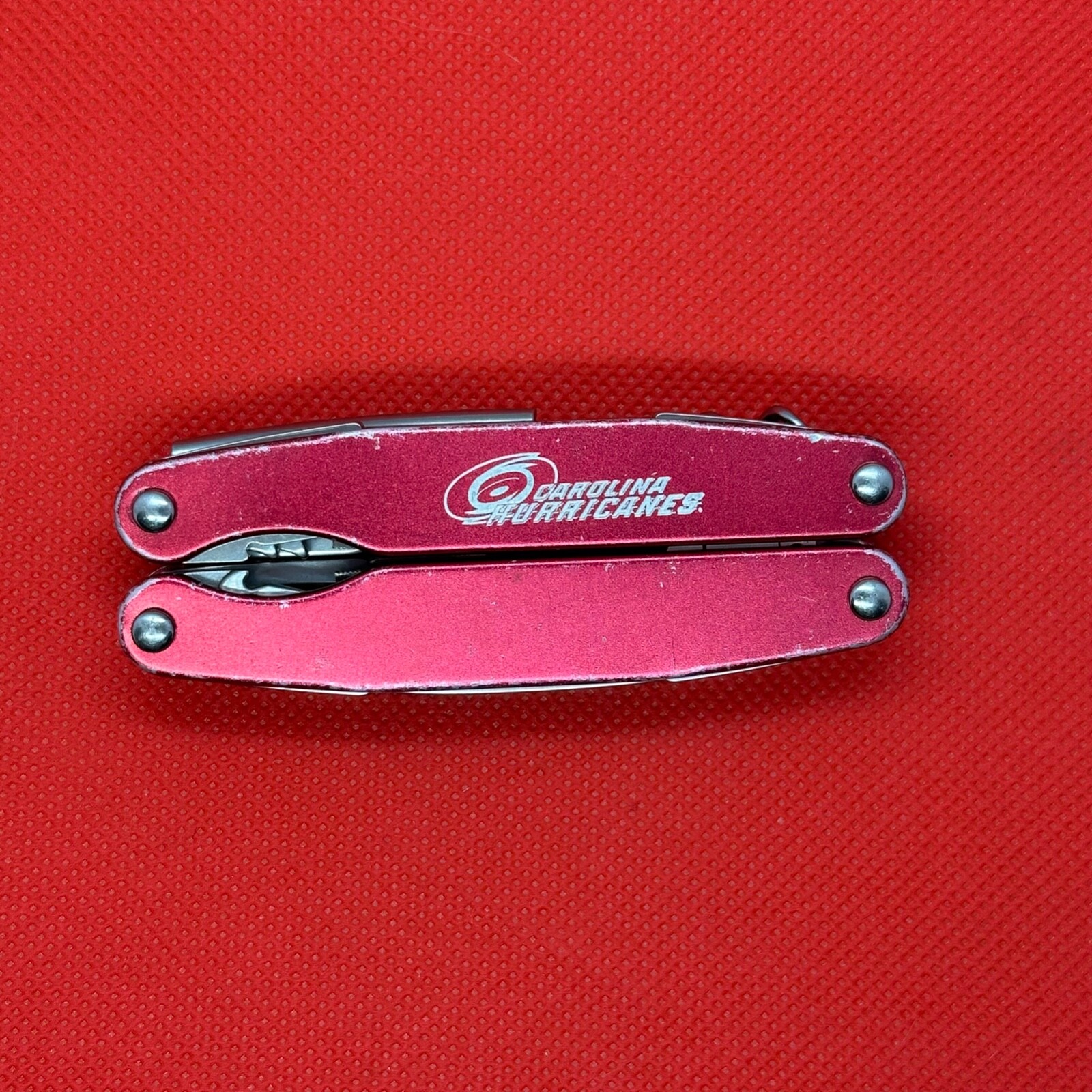 Retired Gen 1 Red “Carolina Hurricanes” Leatherman Juice C2 Multitool. **READ**