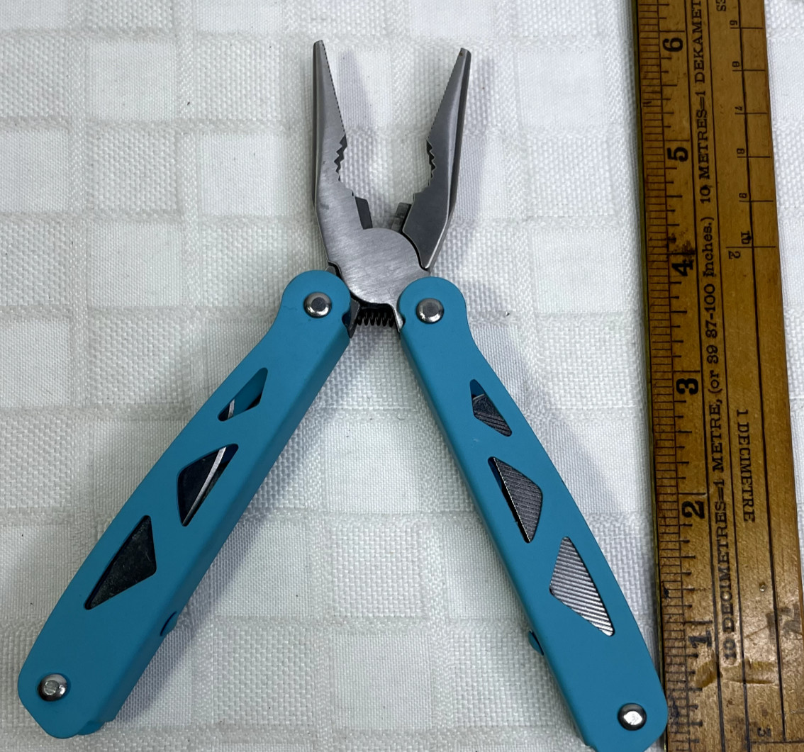 Ozark Trail 12-in-1 Multi Tool with Nylon Black Sheath Teal Blue handle.