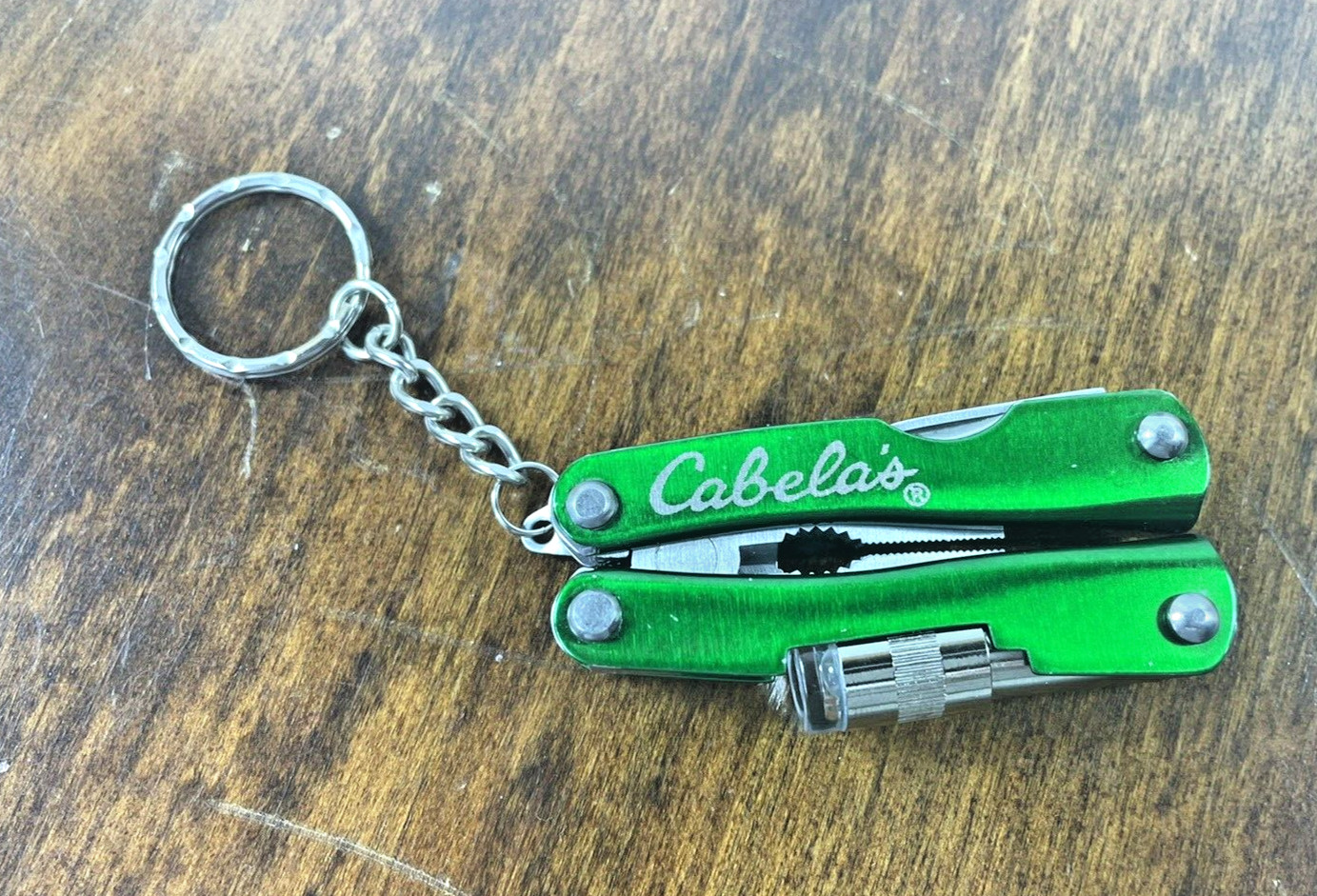 Cabela’s Mini Multi-Tool LED Light Pliers Blade Screwdriver Bottle Opener Knife