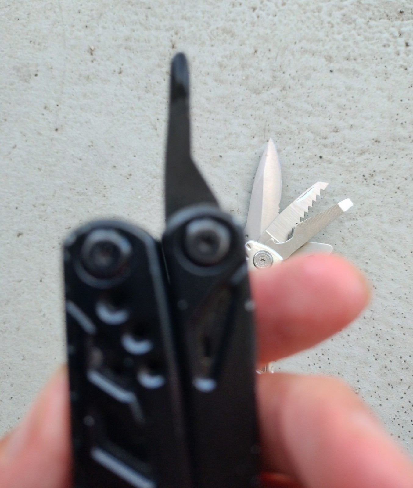 POHAKU BLACK & SILVER MULTI TOOL PLIERS KNIFE, SAW BLADE, FILE, ETC. LOT OF 2