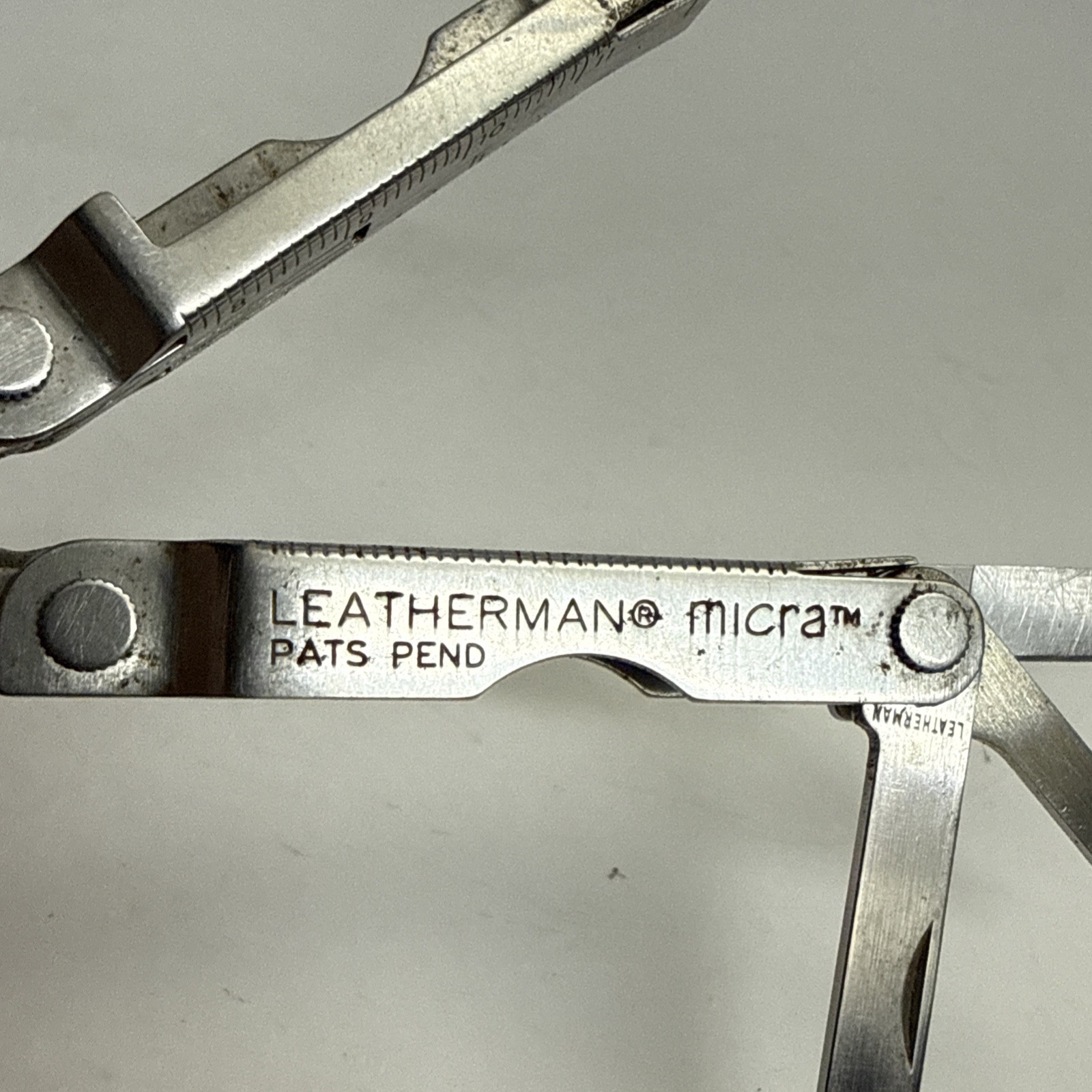 Leatherman Micra Stainless 10-in-1 Multi-Tool Camping Hiking Fishing – As Is