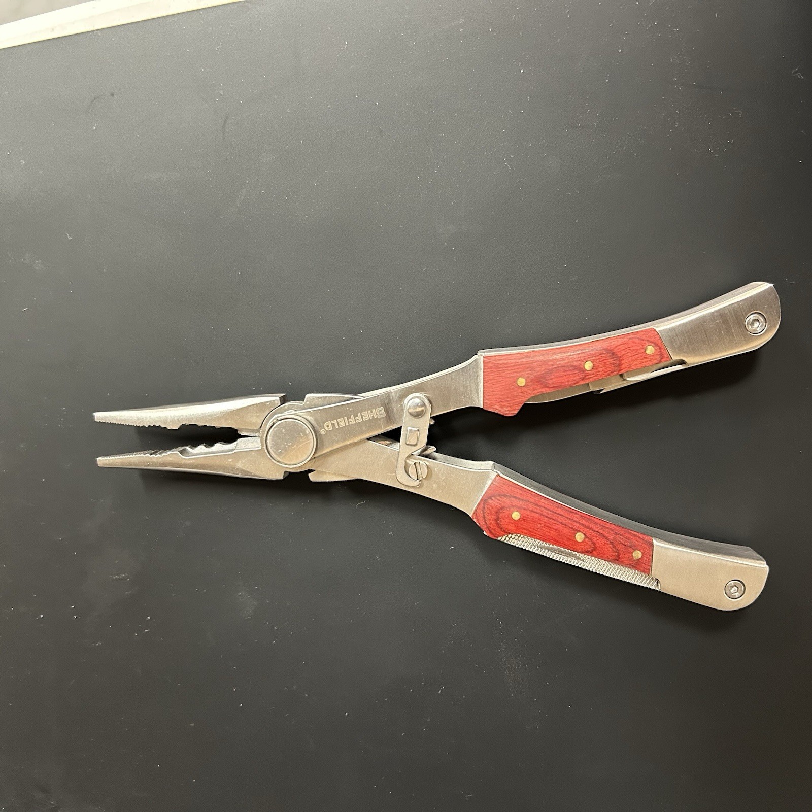 SHEFFIELD #12704 STAINLESS STEEL FOLDING PLIERS & MULTI TOOL KNIFE SAW