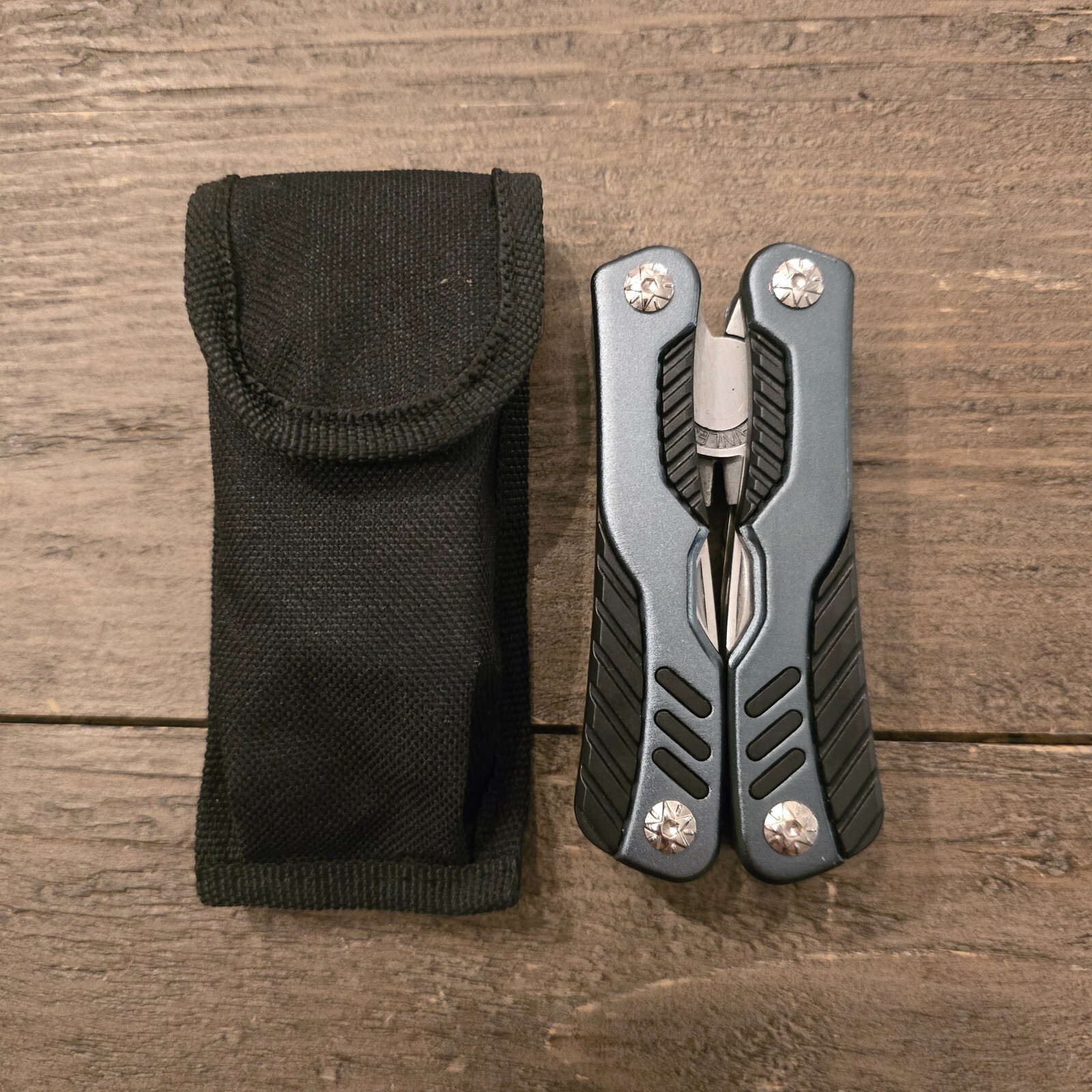 Puma TEC multitool AISI 420 pliers w spring two-tone aluminum handles