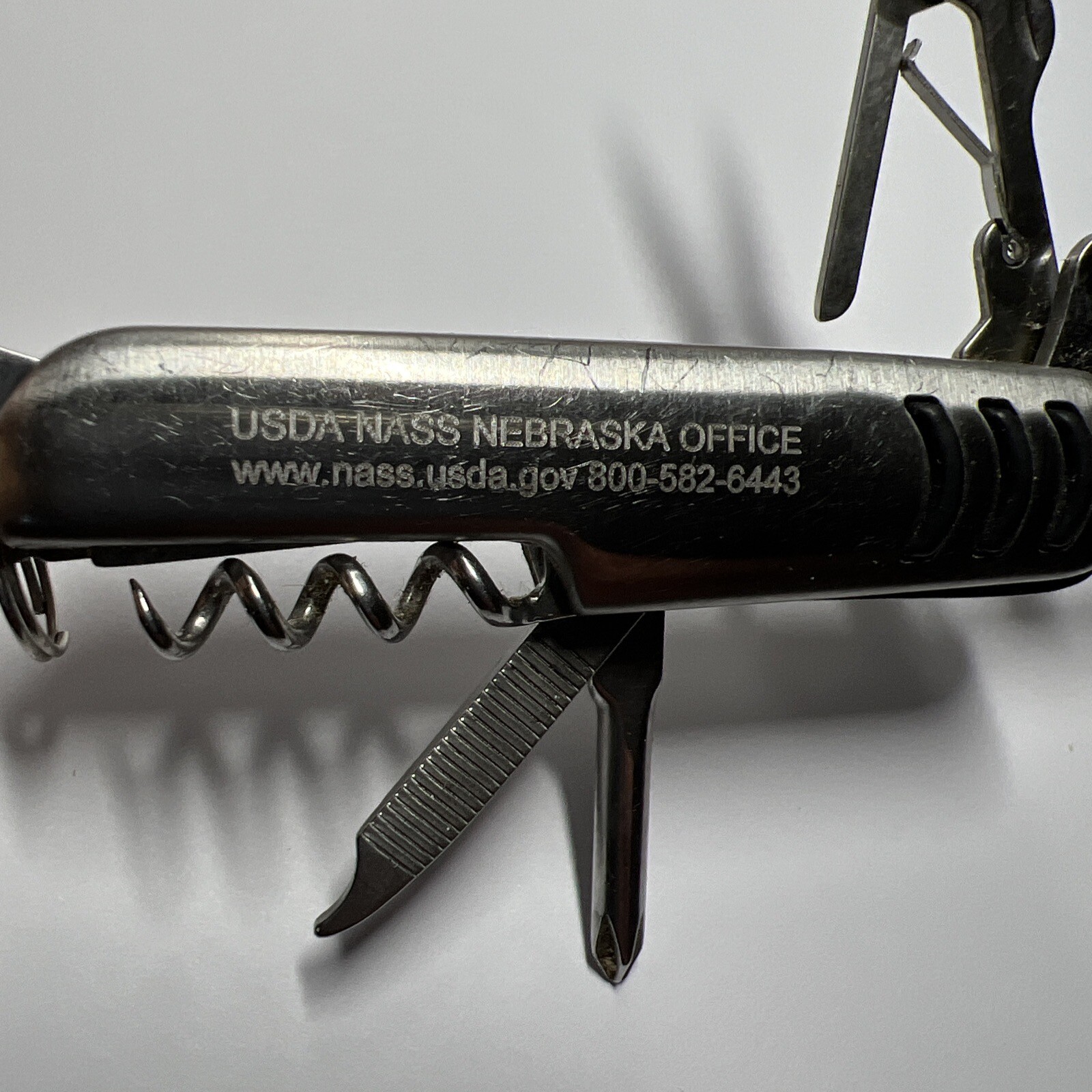 Stainless Steel Multi Tool 7-in-1 Pocket Knife Can Opener Corkscrew Scissors