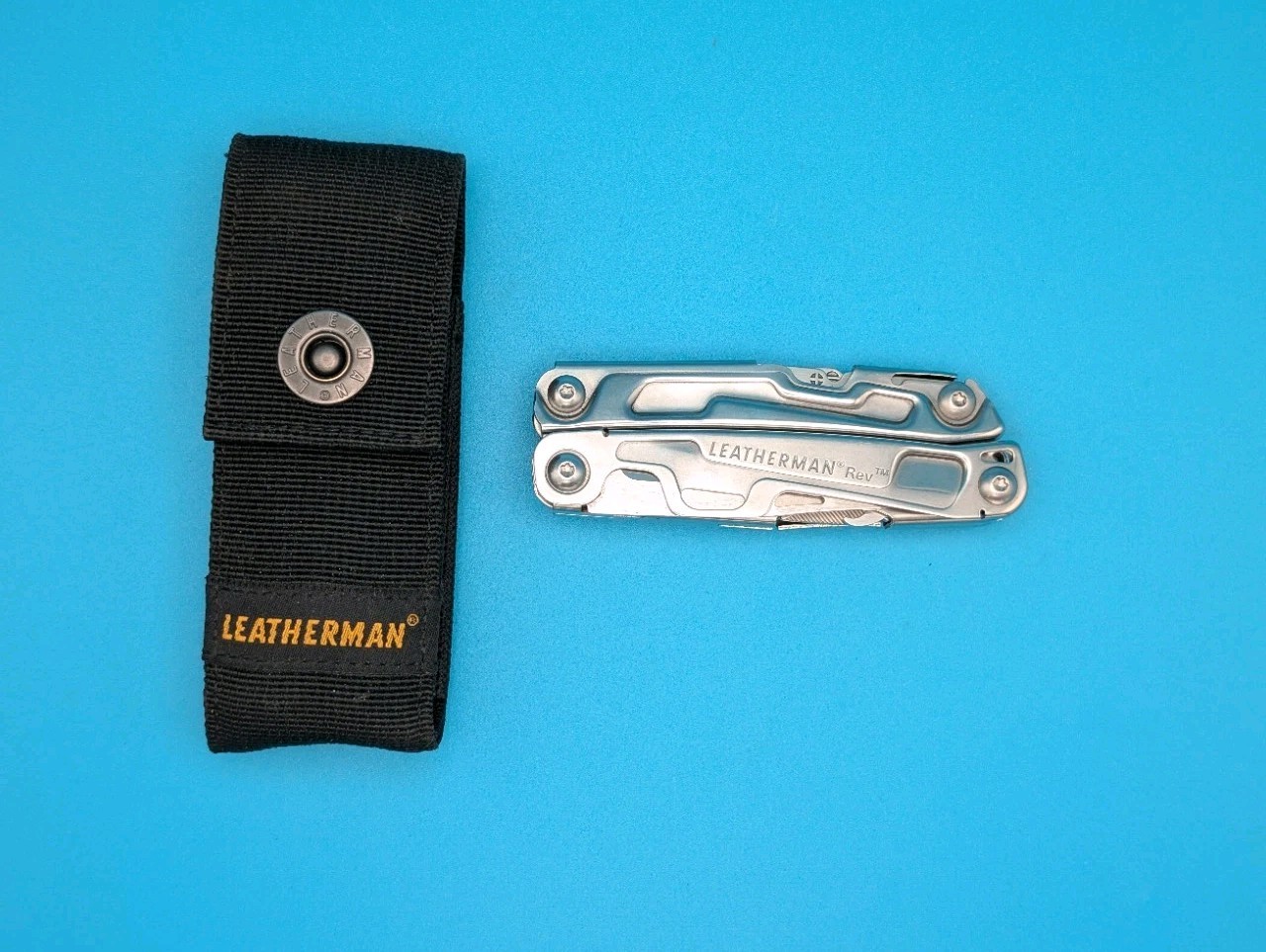 Leatherman Rev 3.8″ Multi-Tool, Stainless! With Sheath!