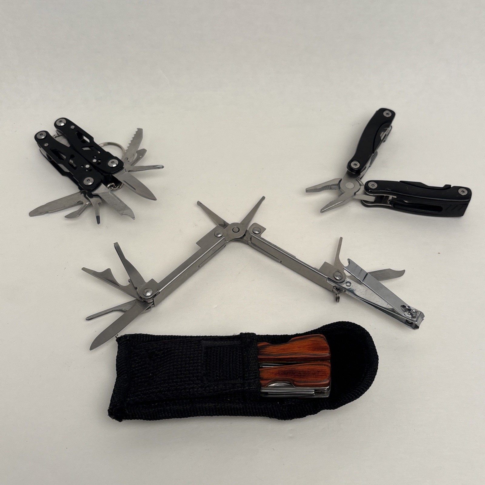 Lot Of 4 Different Function Multi-Tools Winchester Nail Clipper & Wood Grain