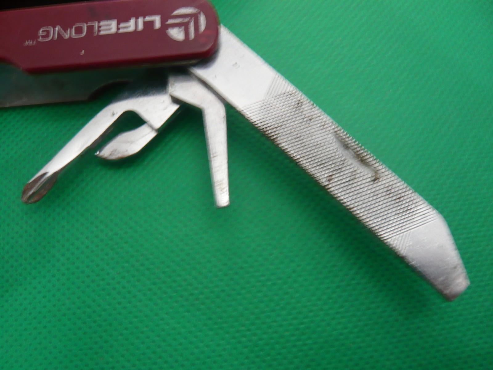 Lifelong Multi Tool 9 Tools in One. Stainless Pliers, knives, tools.