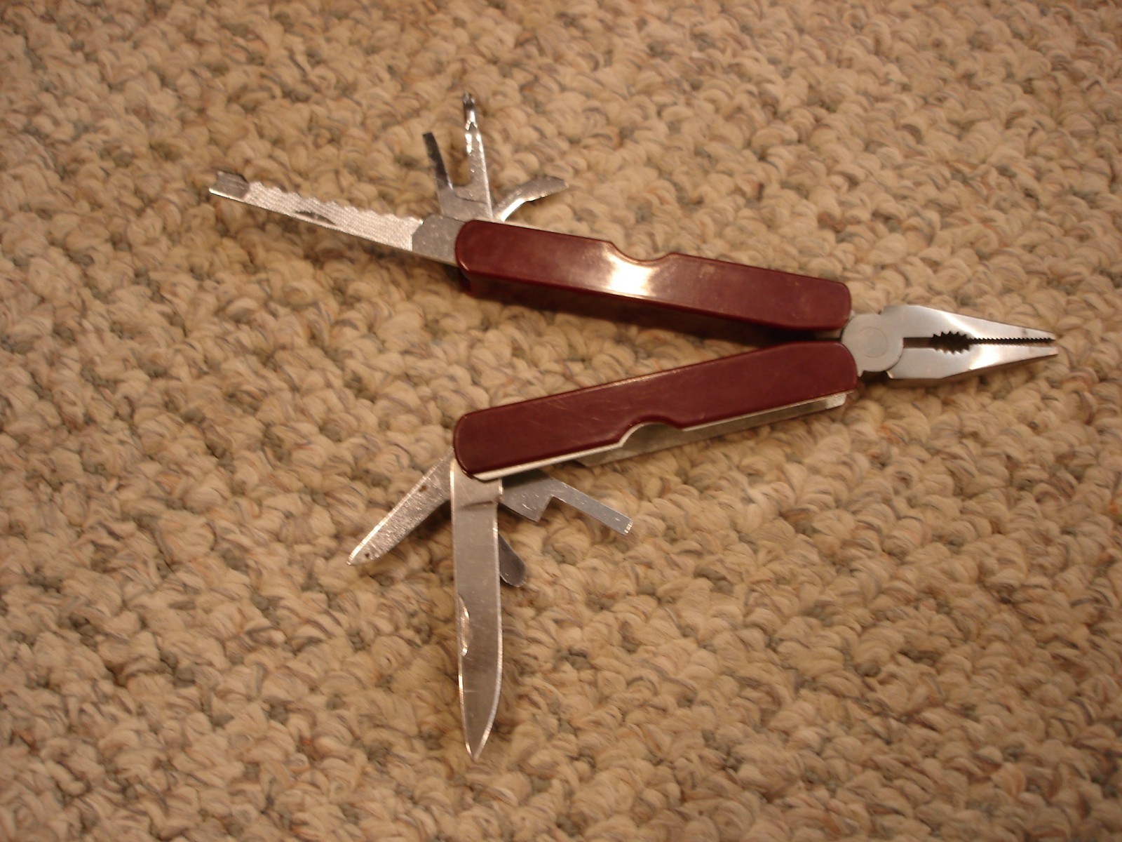 Leatherman vintage multi tool dark red handle 9 tools in one