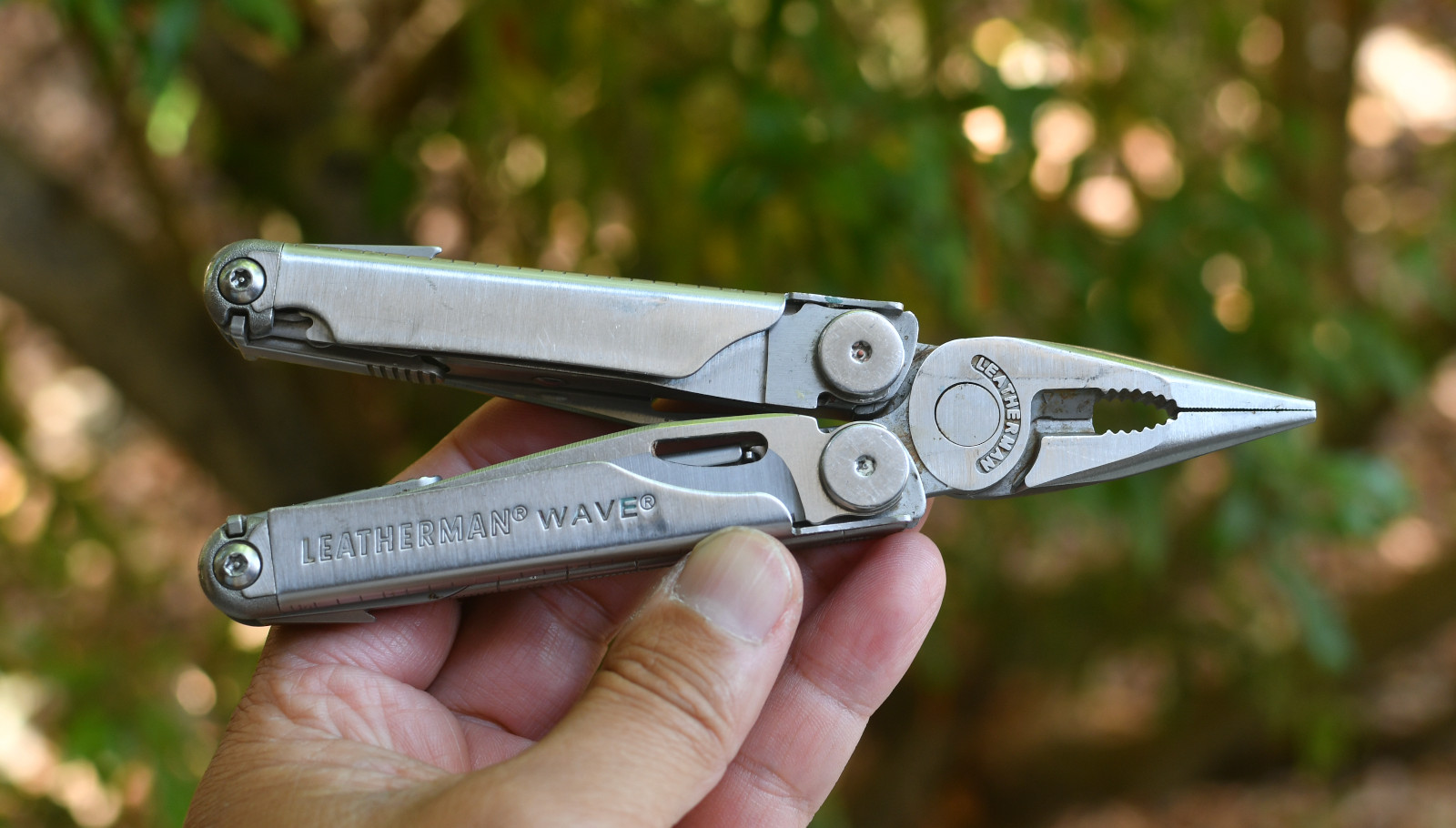 LeatherMan Wave Pocket Knife  Blades Rust