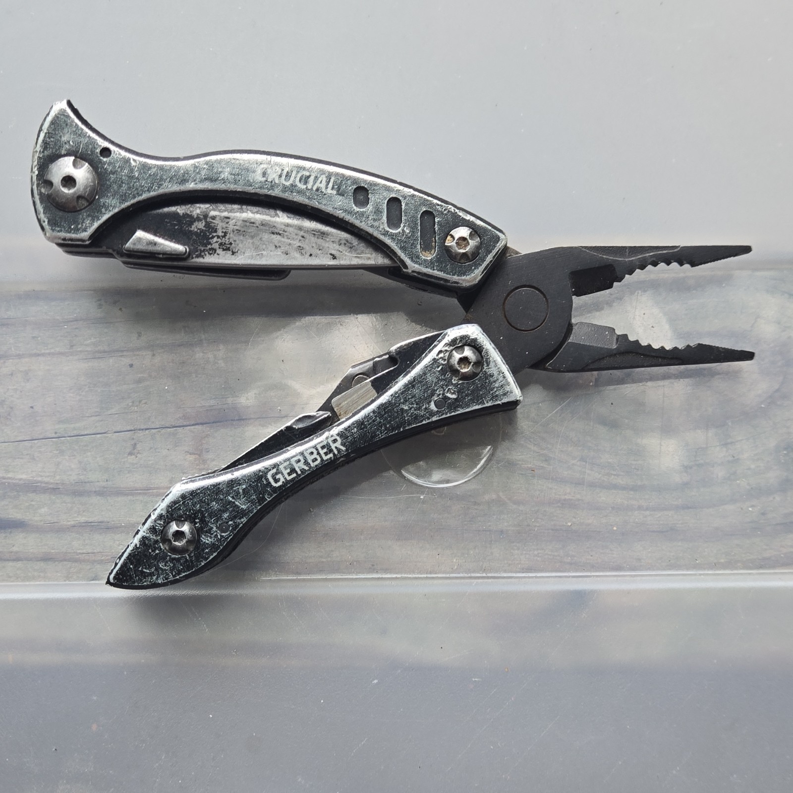 Gerber Crucial 9-in-1 Multi-Tool Pliers, 2.25″ Serrated Knife, Silver/Black