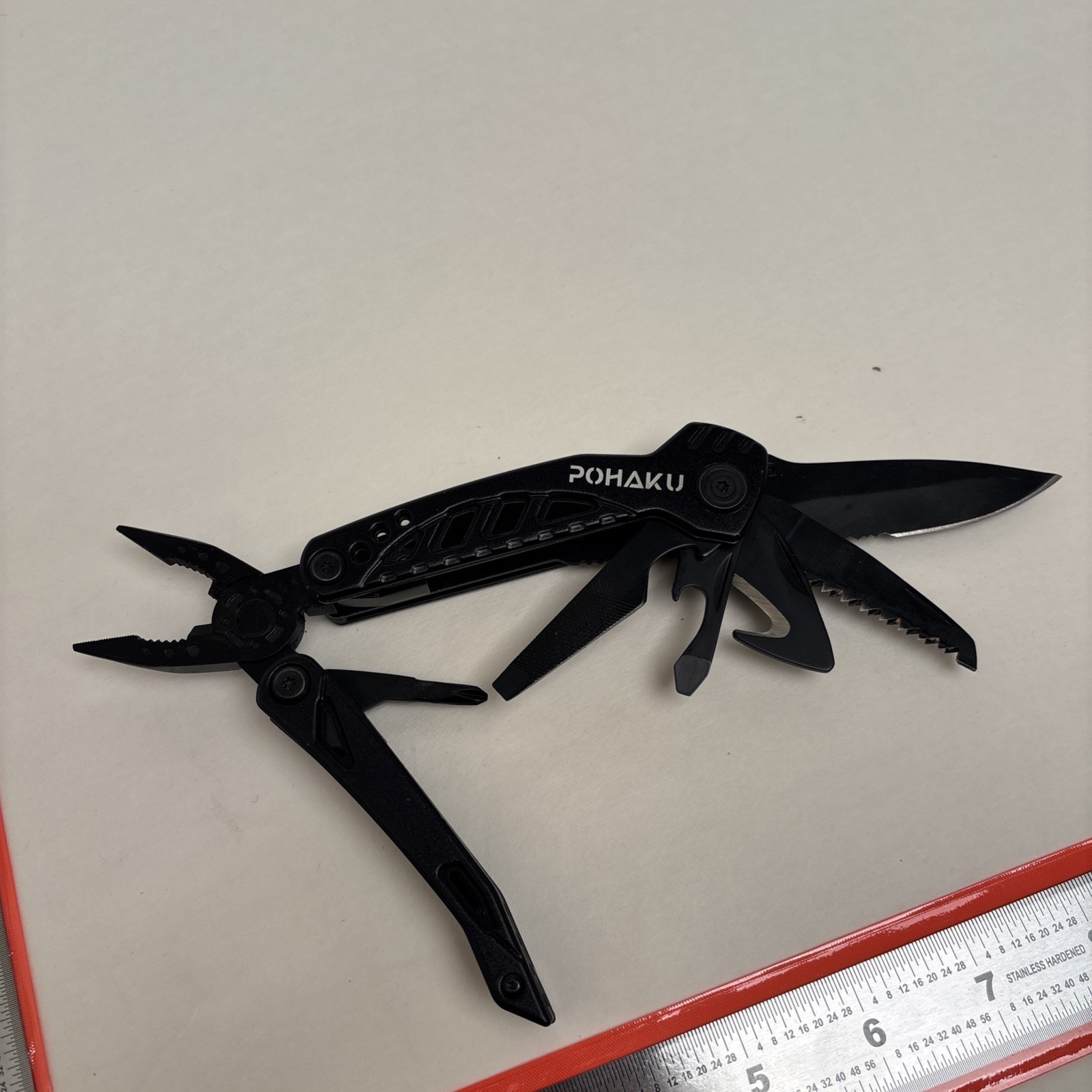 POHAKU BLACK MULTI-TOOL WITH PLIERS, KNIFE, SAW, FILE, SCREWDRIVERS