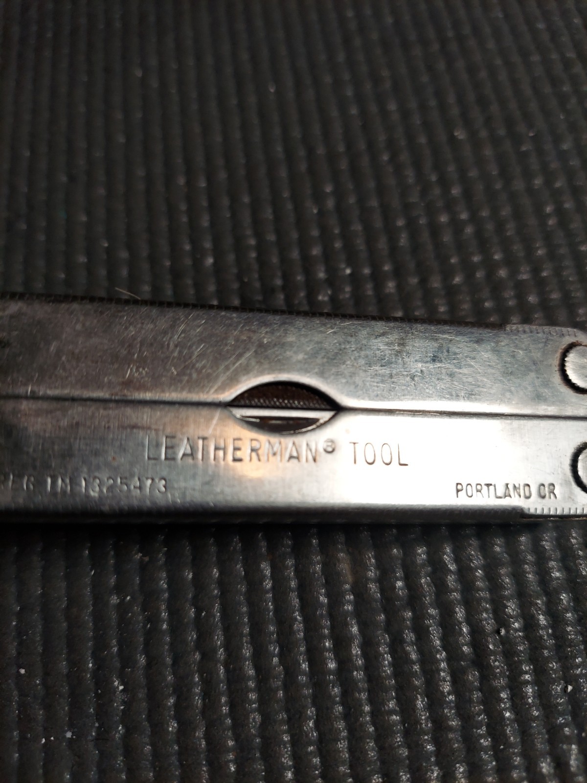 Original vintage Leatherman multi-tool, U.S. registered trademark (TM 1325473).