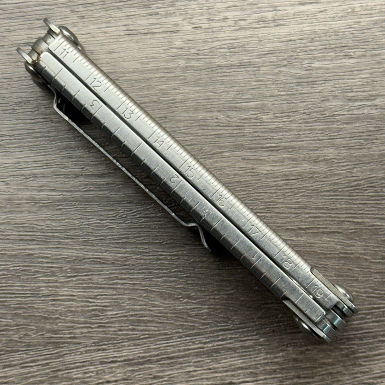 Leatherman Sideclip multitool. Lightly used. Late Run: shiny factory polished