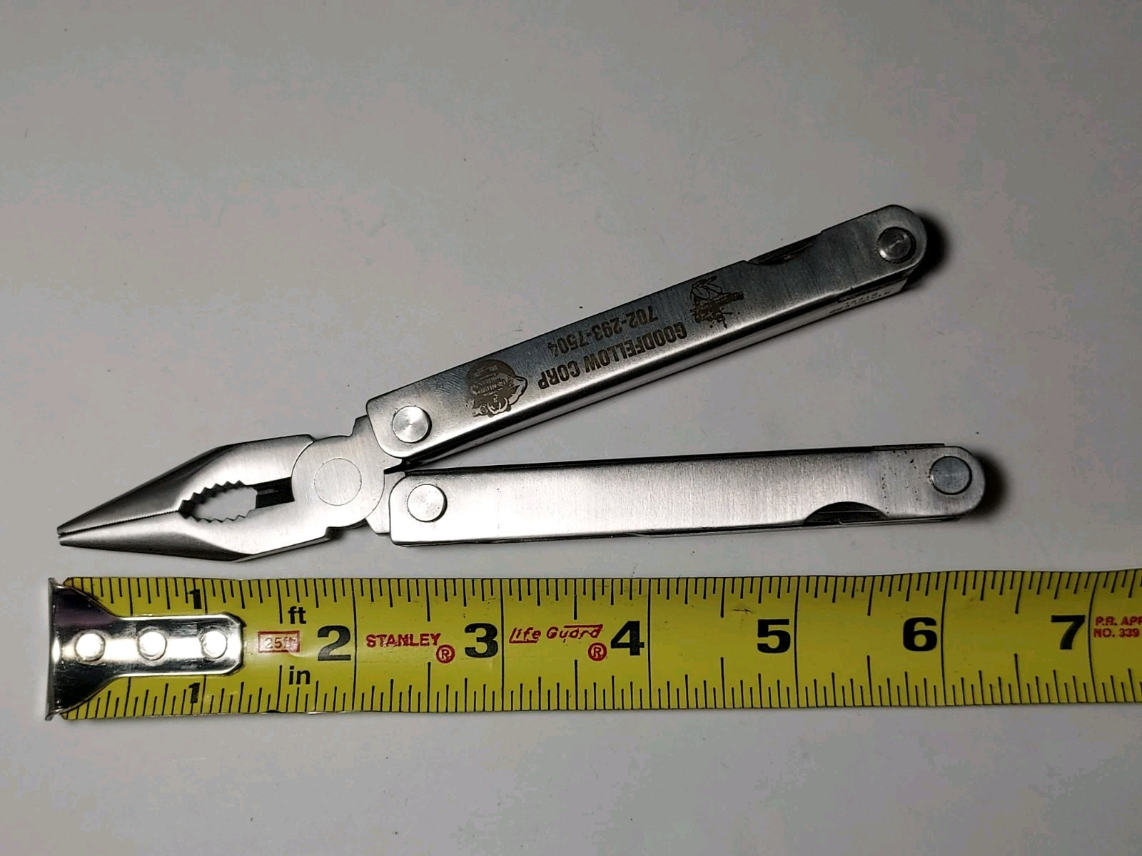 Multi Tool + Nylon Pouch advertising Goodfellow Corp – Pliers, Blade