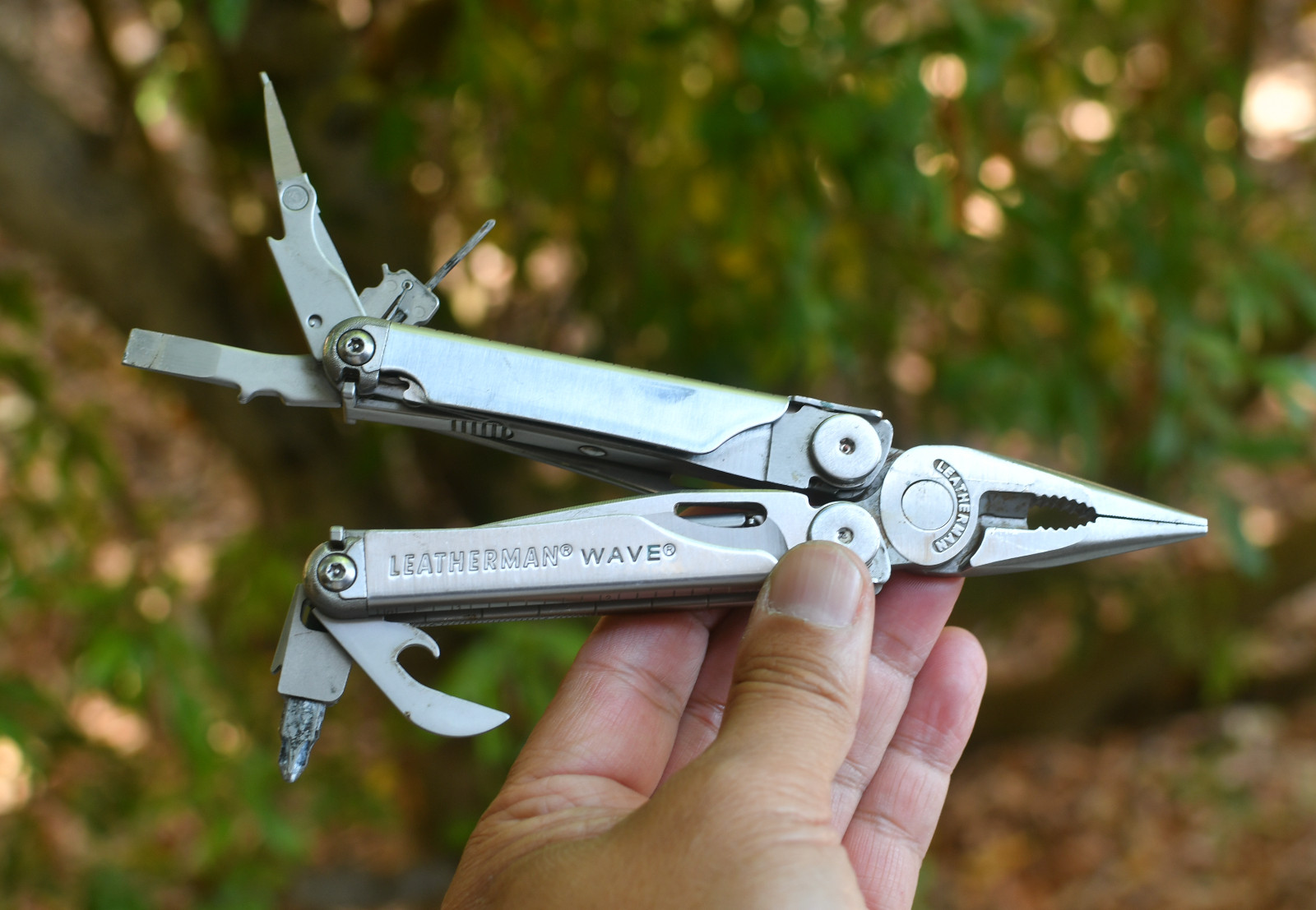 LeatherMan Wave Pocket Knife  Blades Rust
