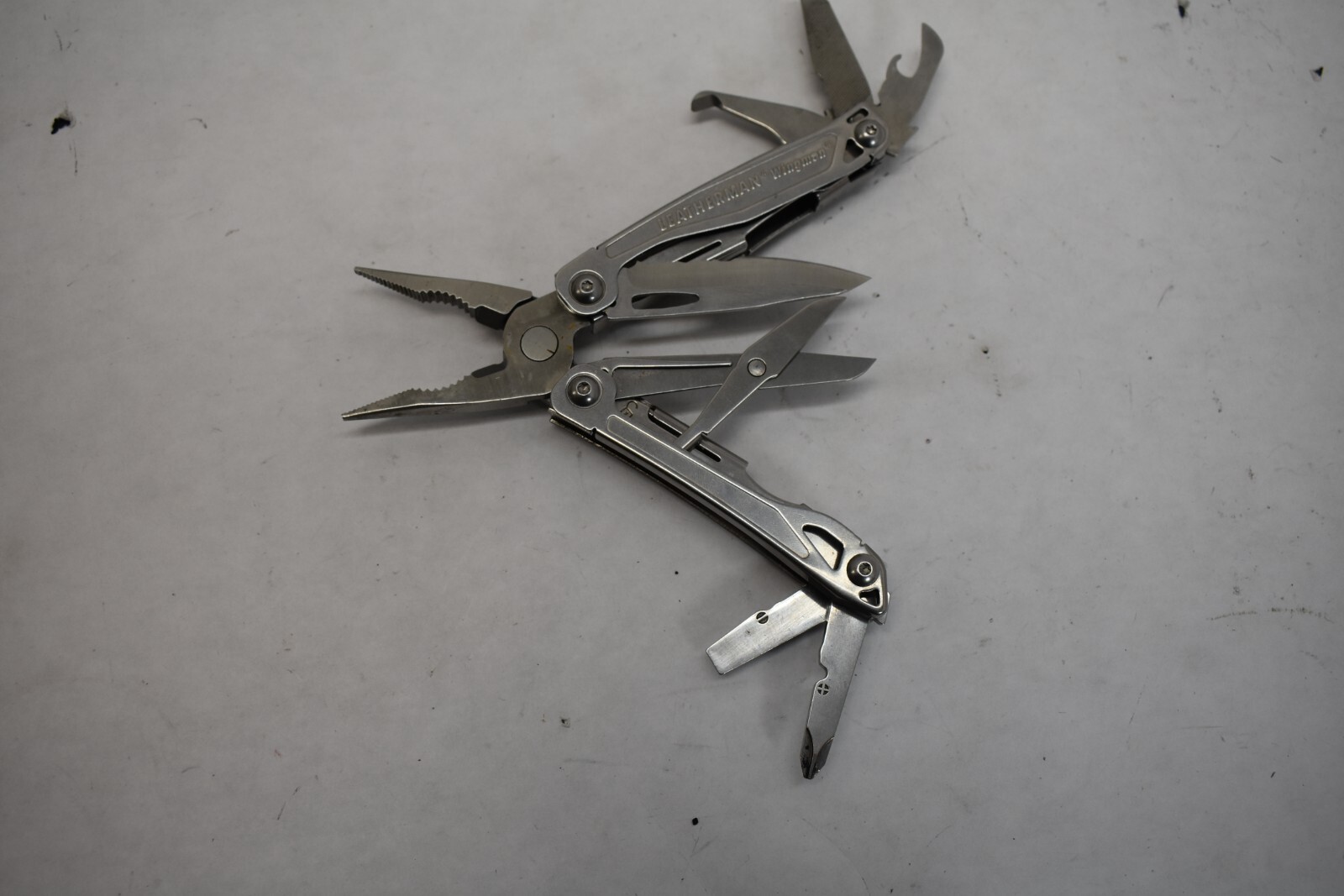 Leatherman Wingman Multi Tool Combo Knife Pliers File Scissors Drivers Openers