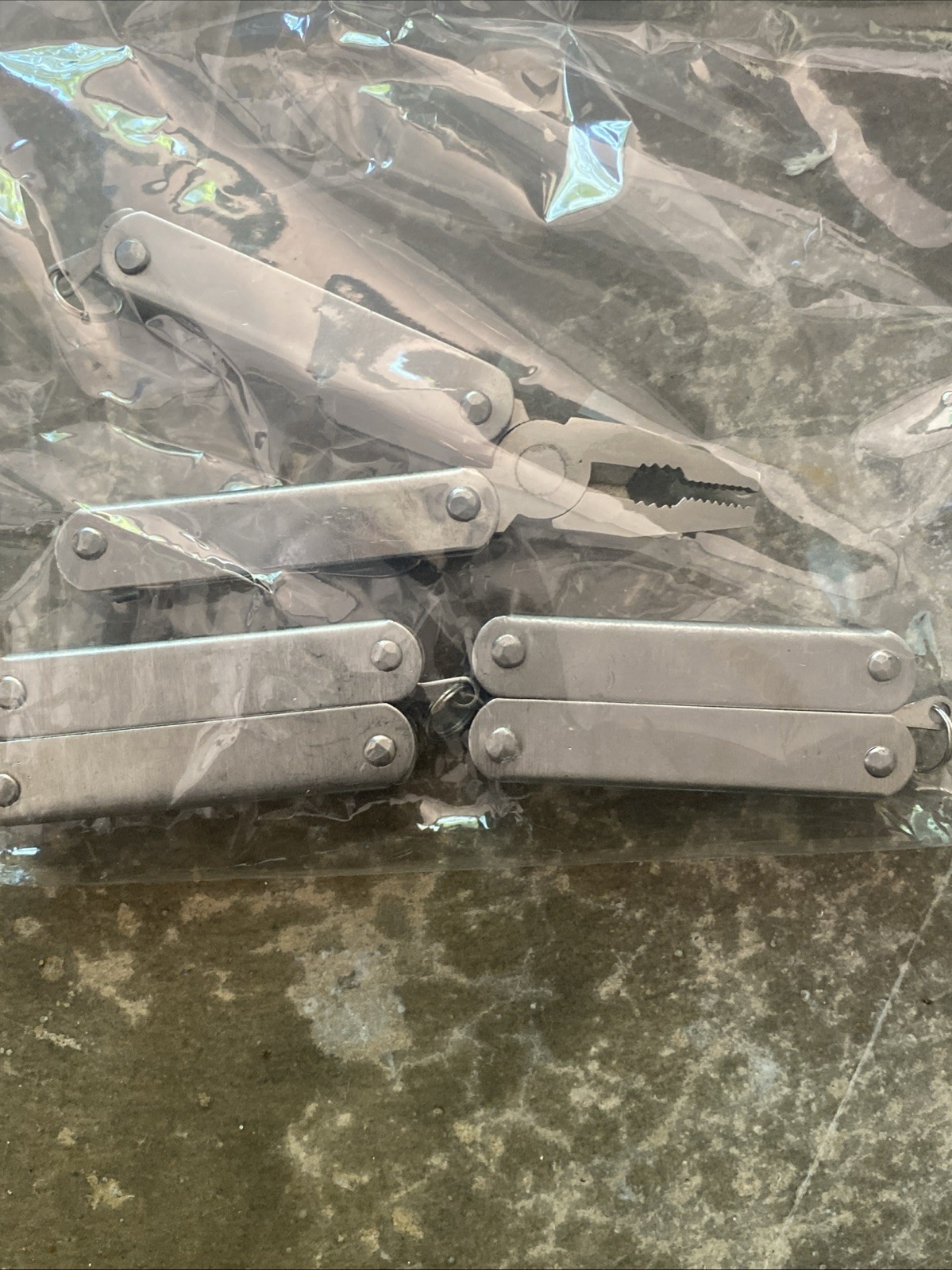 5 Unbranded Folding Pocket Multi Use Tool, Used Good Condition