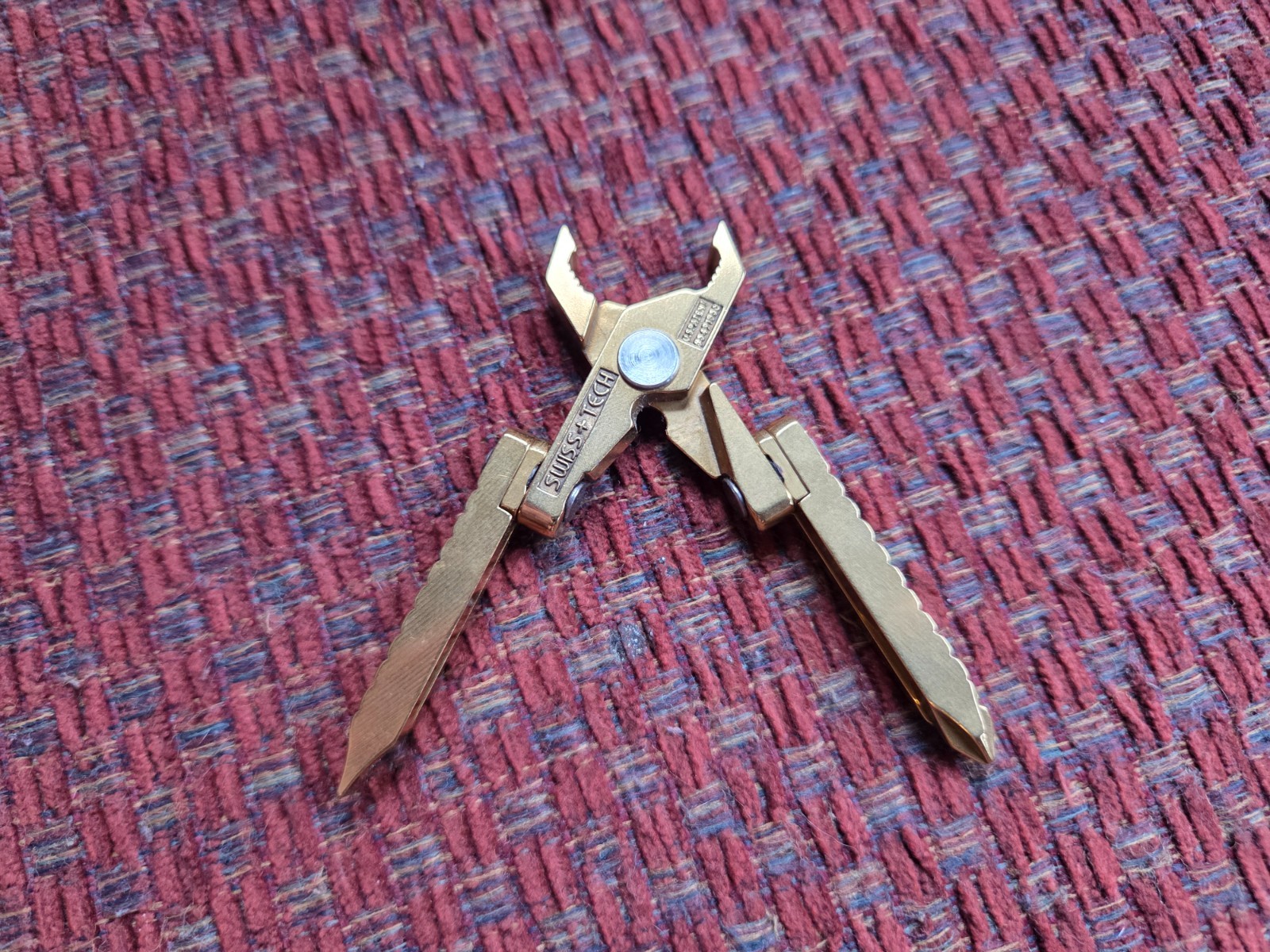 Swiss+Tech gold US patent #5491856 compact multi-tool