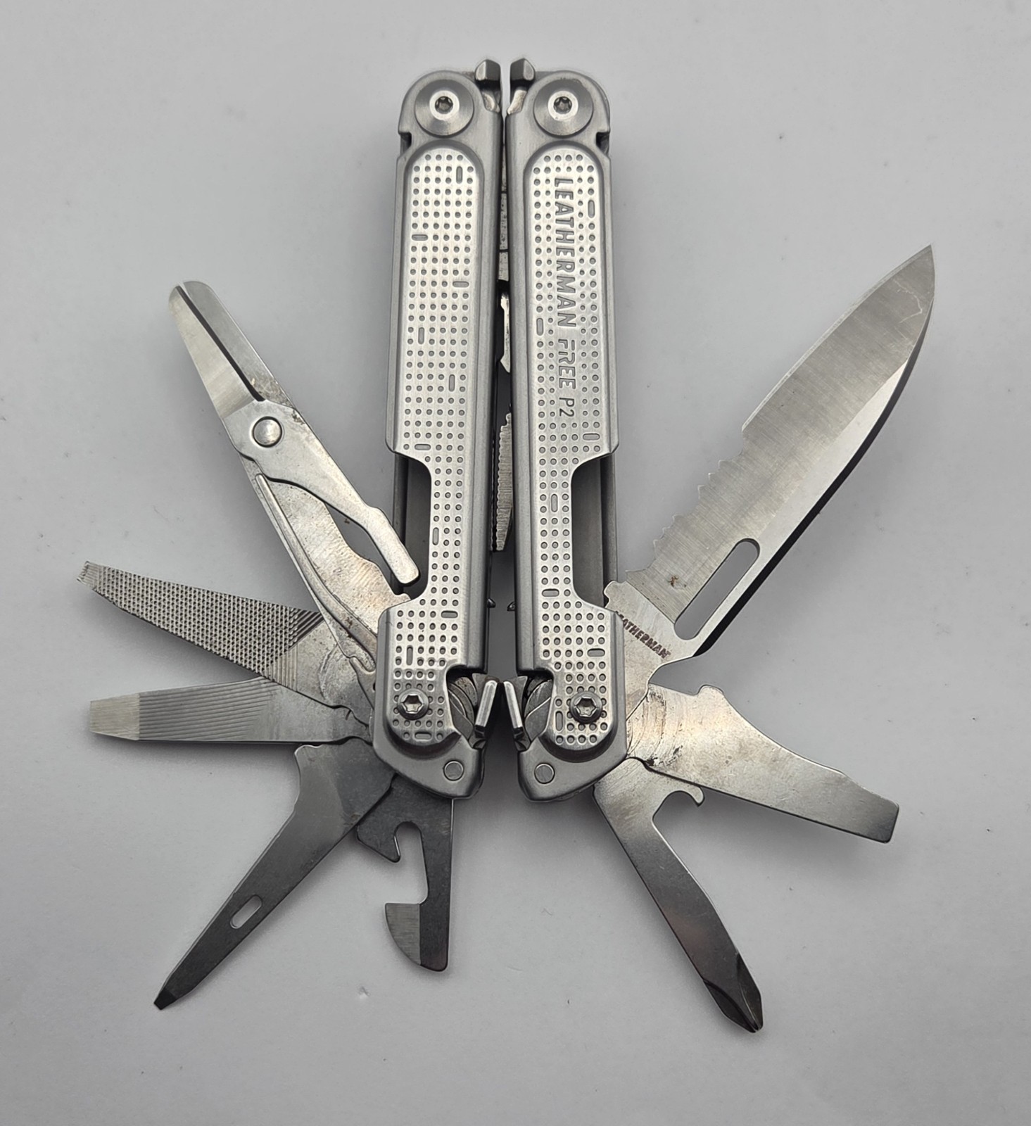 Retired Leatherman Free P2 Stainless Steel Multi-Tool Silver Great Condition
