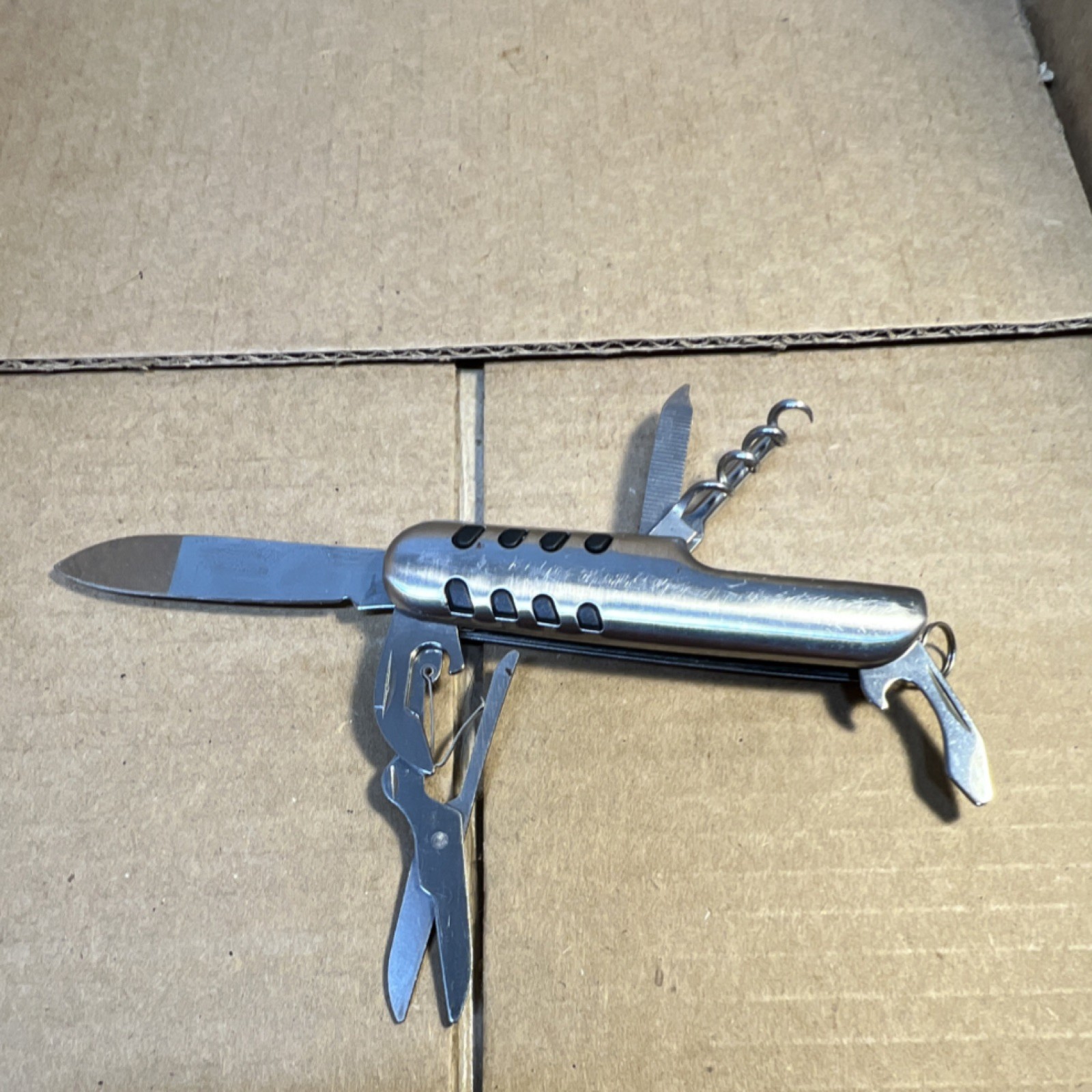 Silver Stainless Steel Multi-Tool with Knife, Scissors, Corkscrew, Bottle Opener