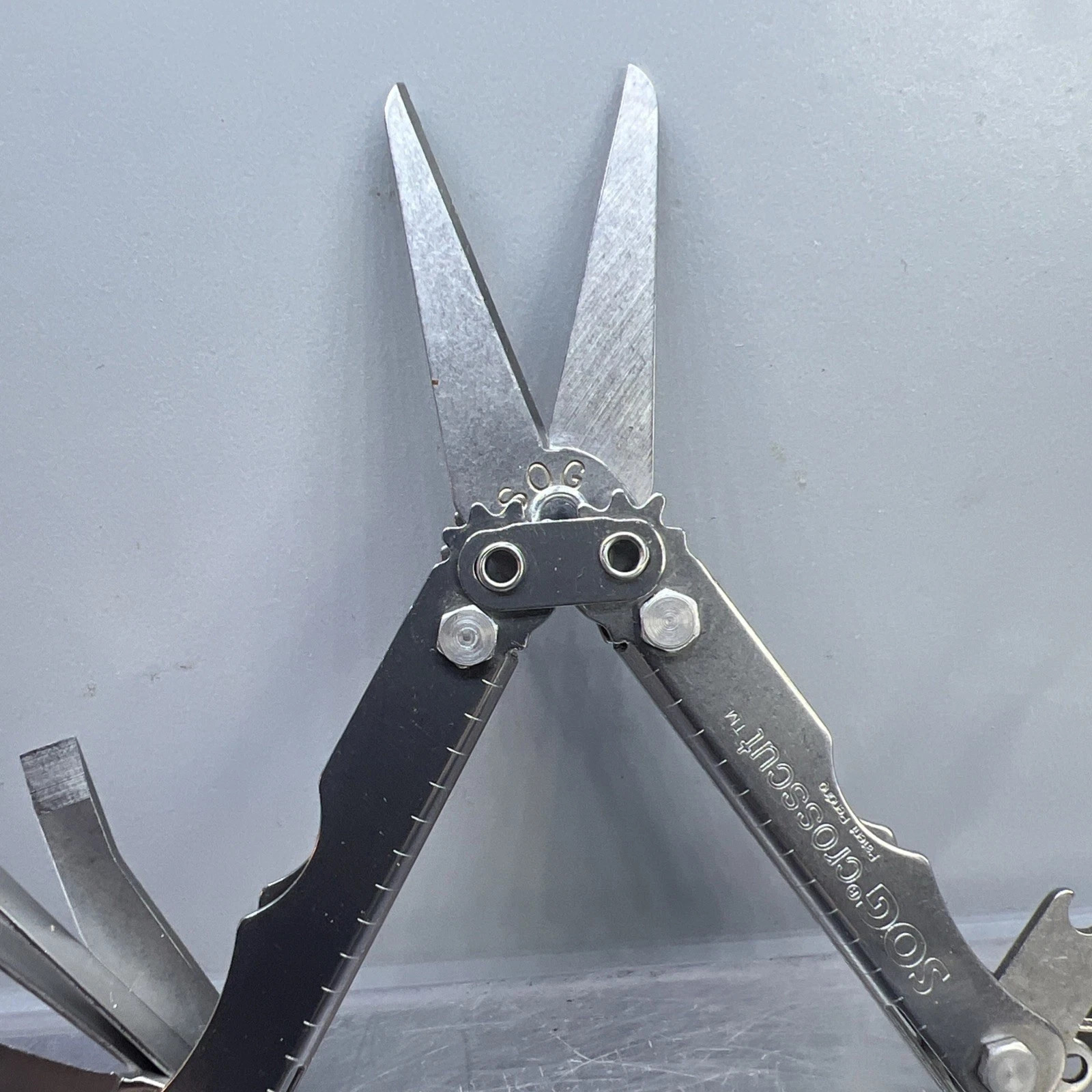 SOG Crosscut Multitool Knife! With man made plasti Leather Sheath! Never Used