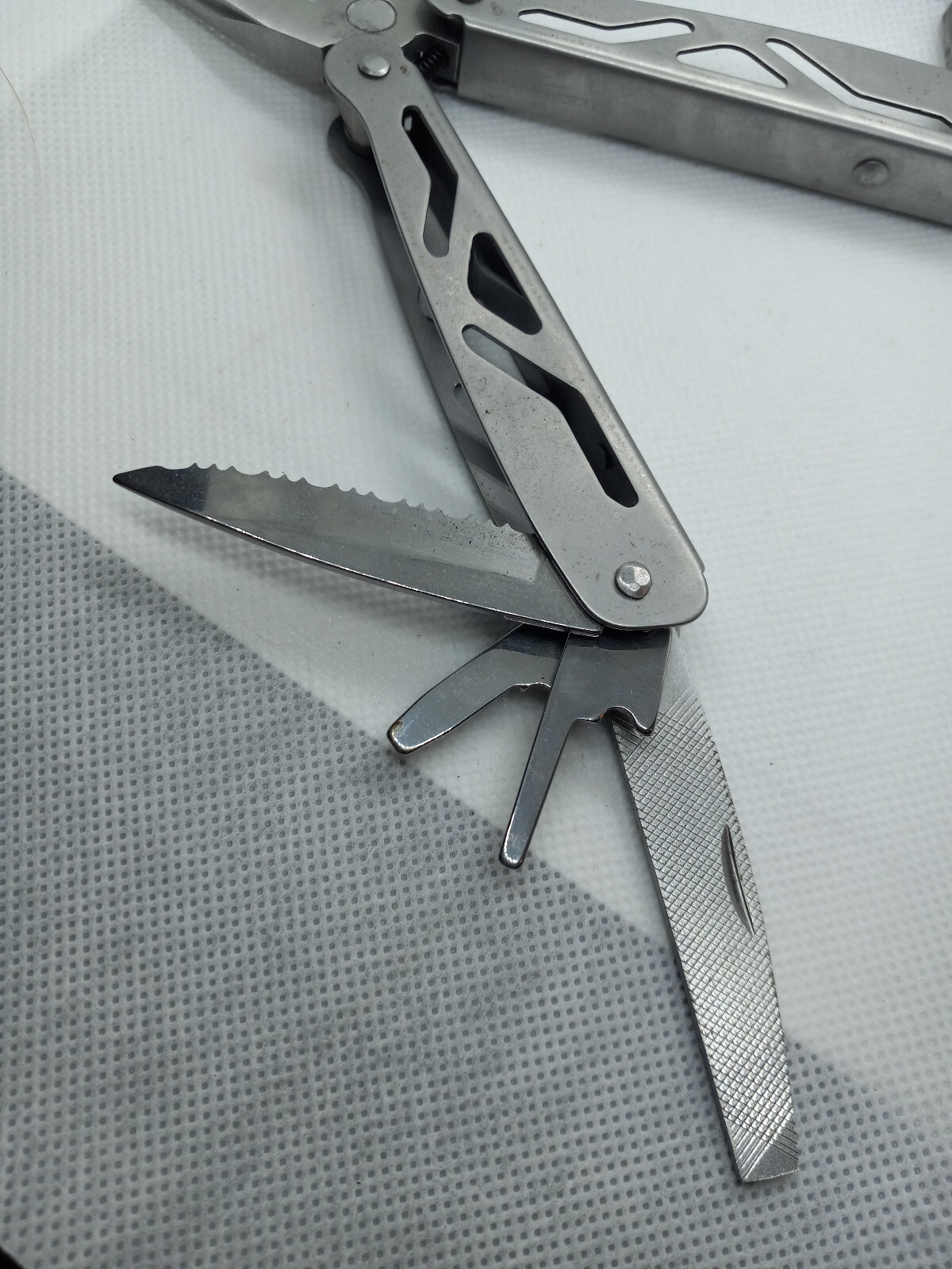 Ozark Trail 12-In-1 Multi Tool Outdoor Equipment includes Sheath