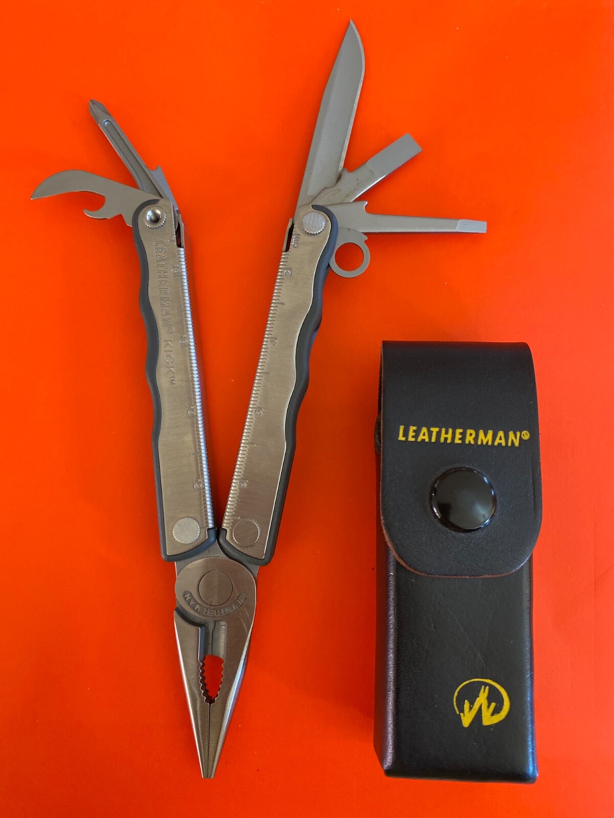Leatherman KICK multitool. New, with vintage Leather Snap belt sheath