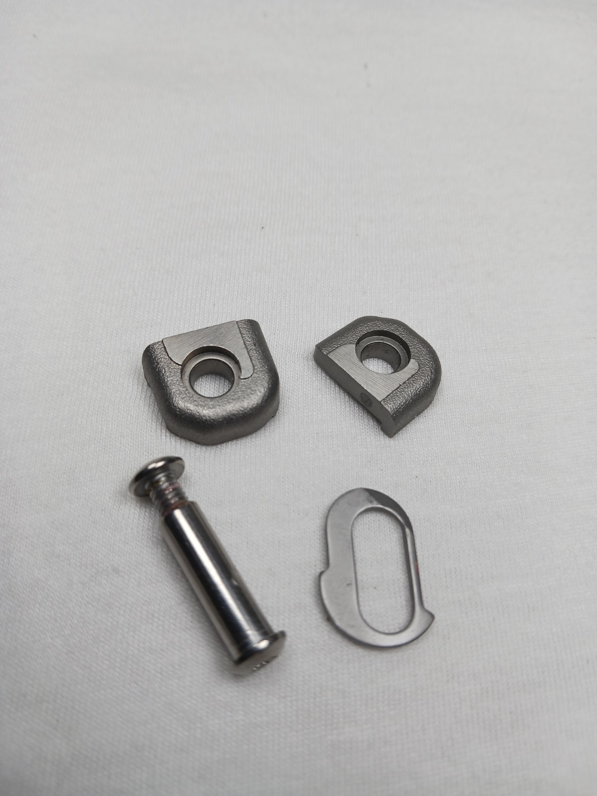 Leatherman Wave handle end caps with lanyard ring and pivot.