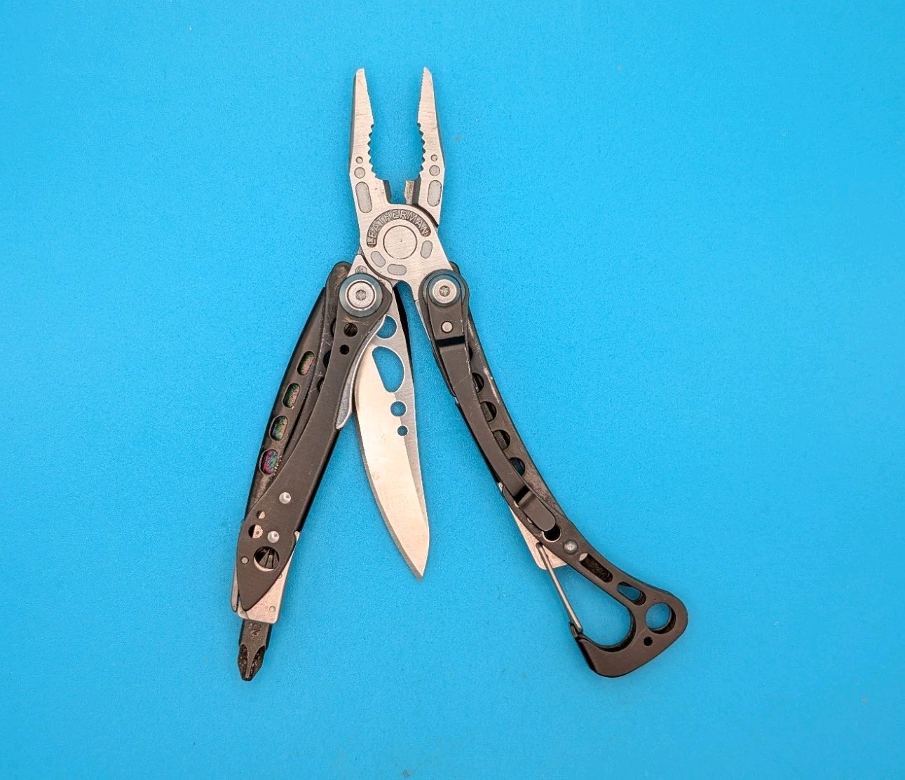 Leatherman Skeletool CX Multitool Plain Edge Knife!
