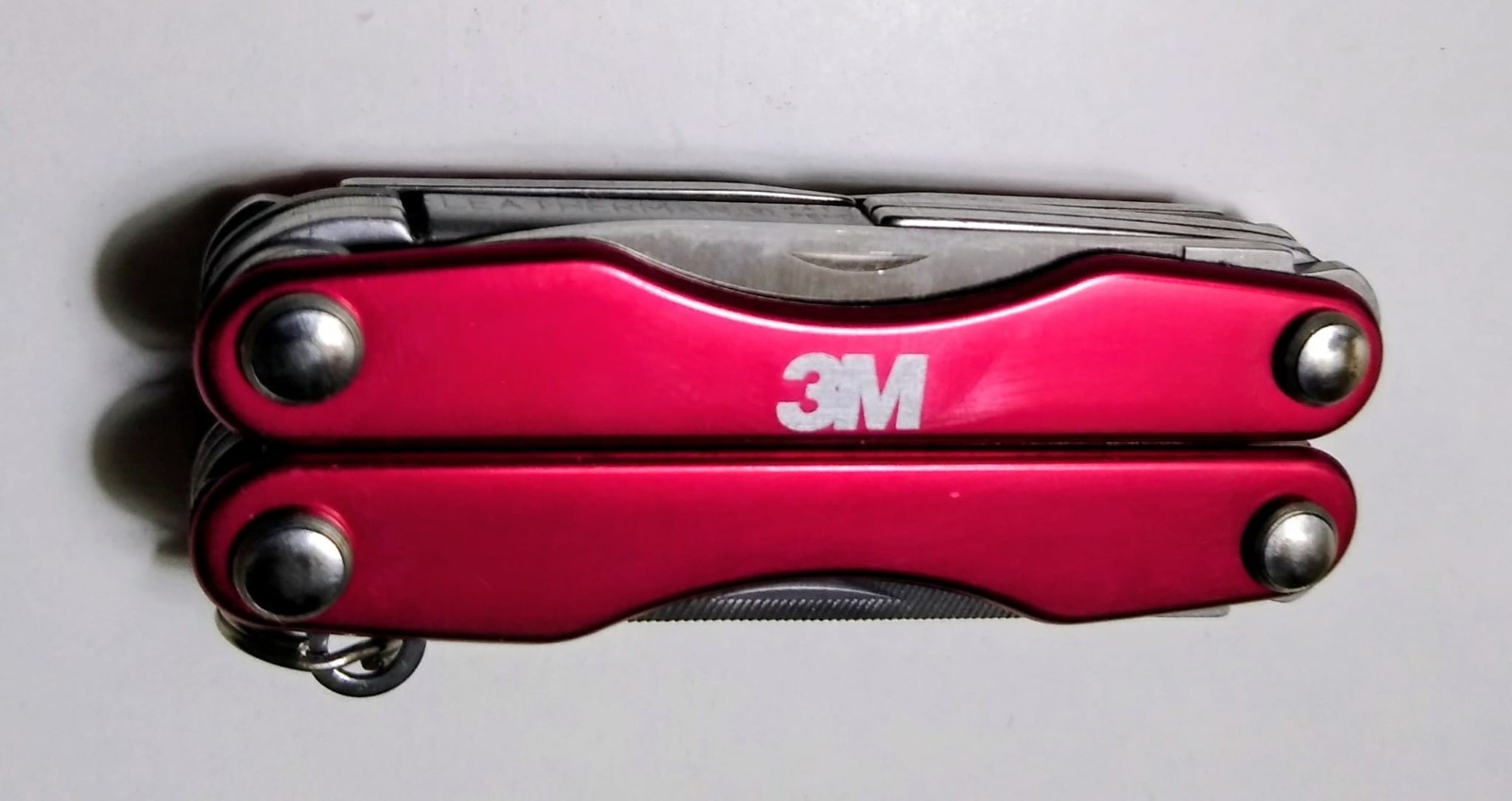 Discontinued Collectible Leatherman Squirt P4 Inferno Red Multitool M3 Logo