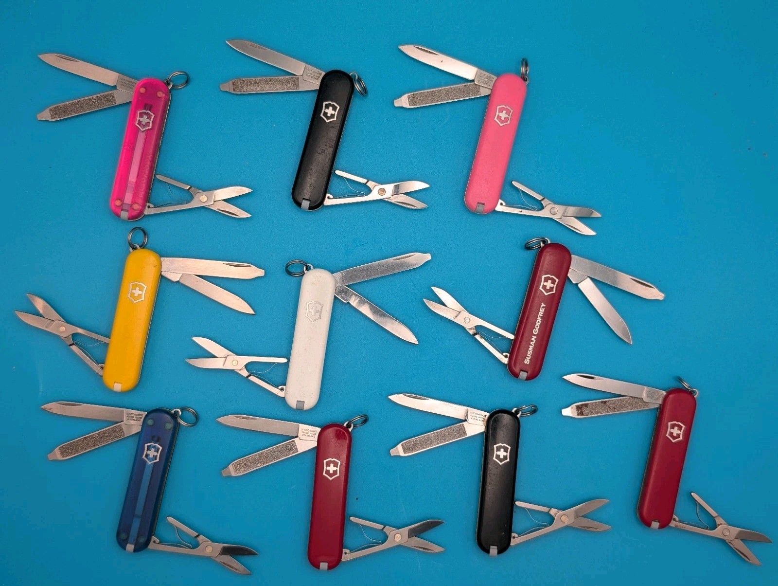 Lot of 10 Victorinox Classic Swiss Army Knife Multi Tools!