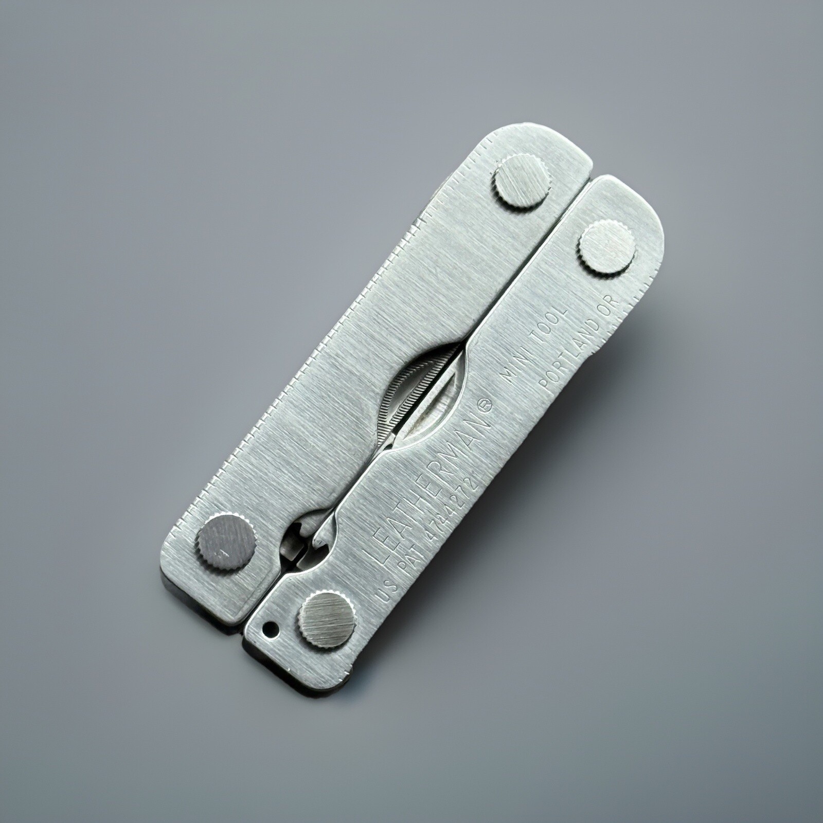 Leatherman MINI TOOL multitool. Variant w/US PAT 4744272 on Both Sides. Engraved