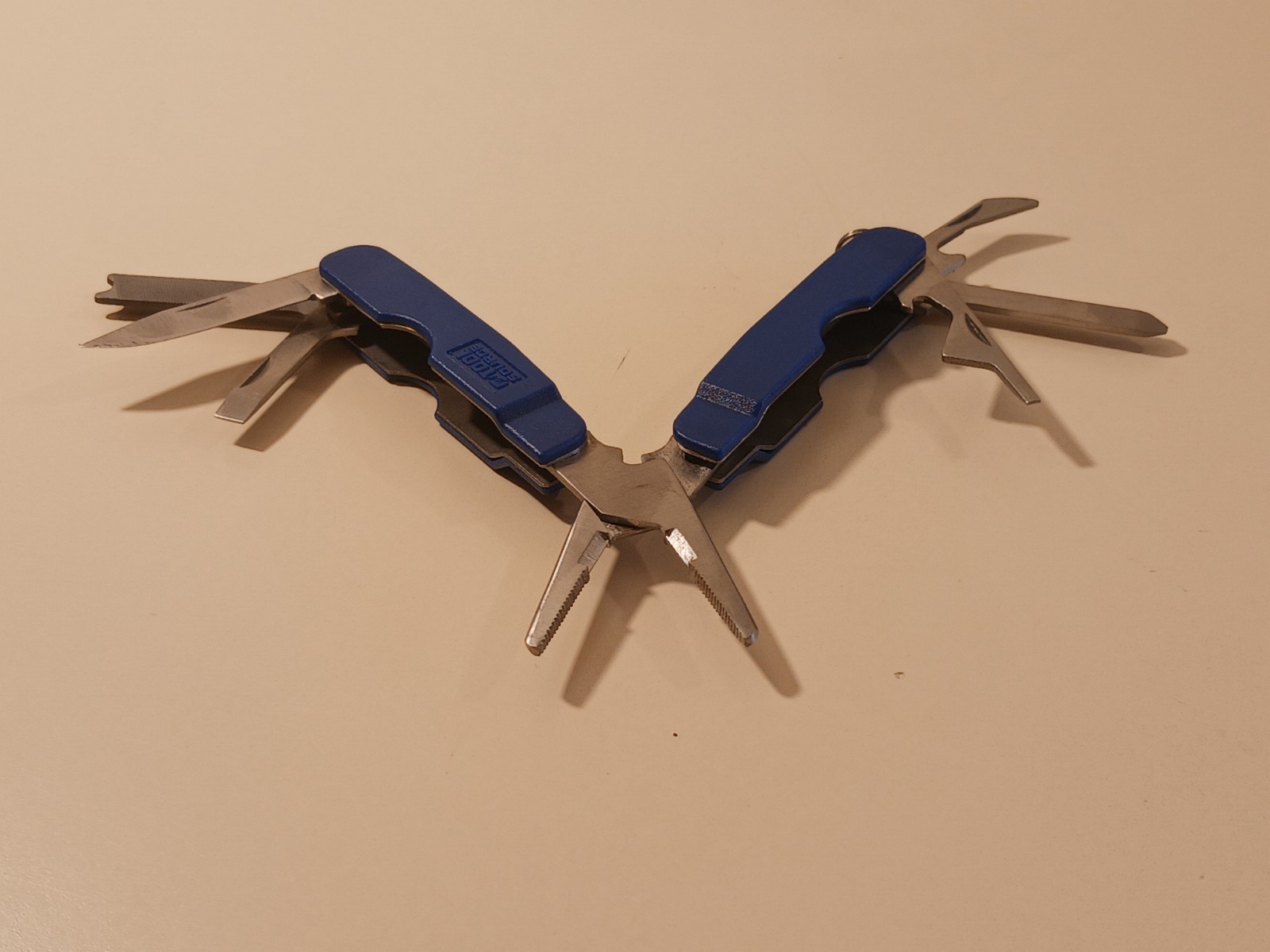 Tool Source 7-in-1 Mini Multi-Tool Pliers Knife Screwdriver File Bottle Opener