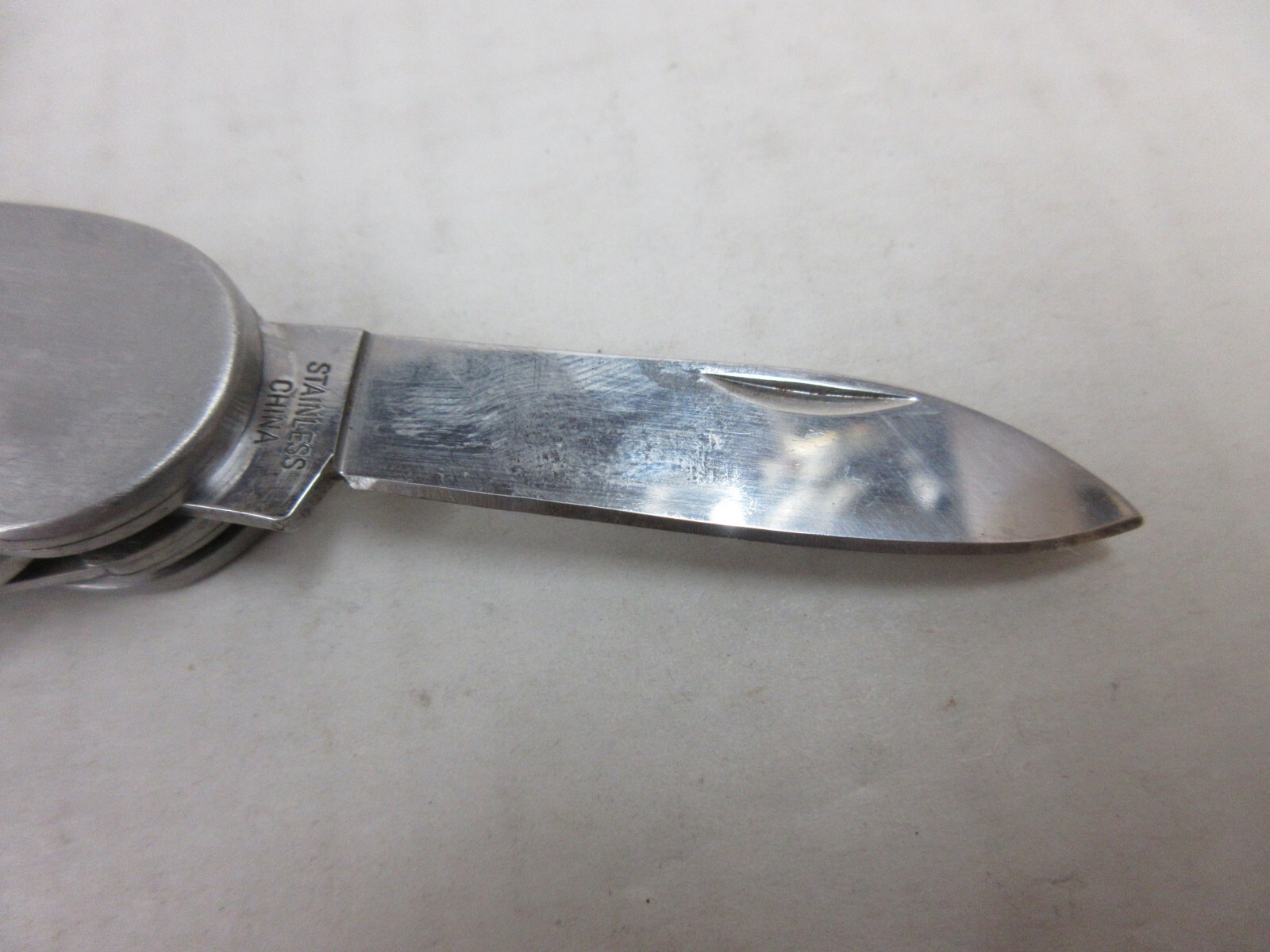 Unbranded 7 Piece Multi-Tool Stainless Steel 4 inch Pocket Camping Knife