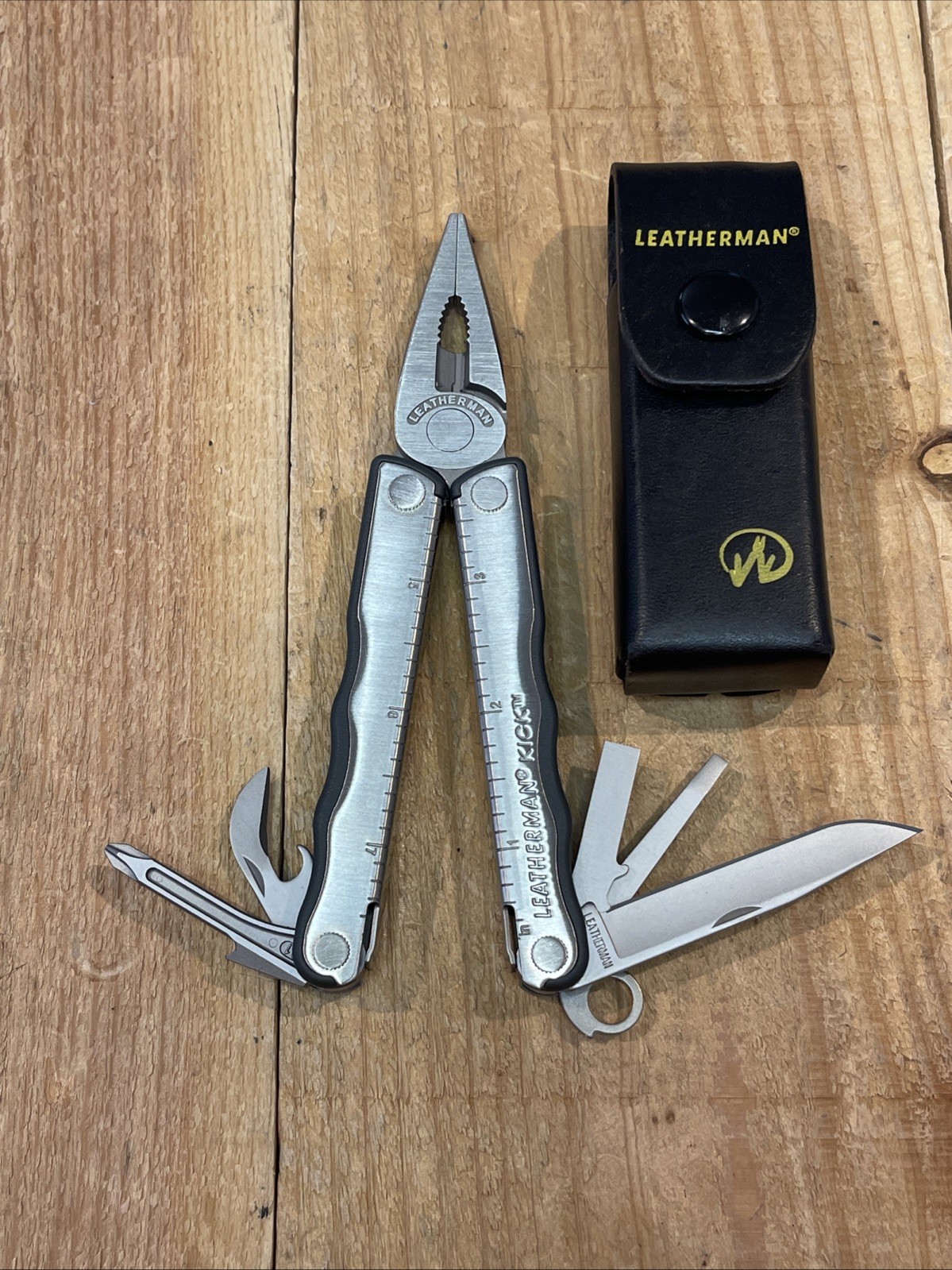 Leatherman KICK multitool. New, with vintage Leather Snap belt sheath Mint Knife