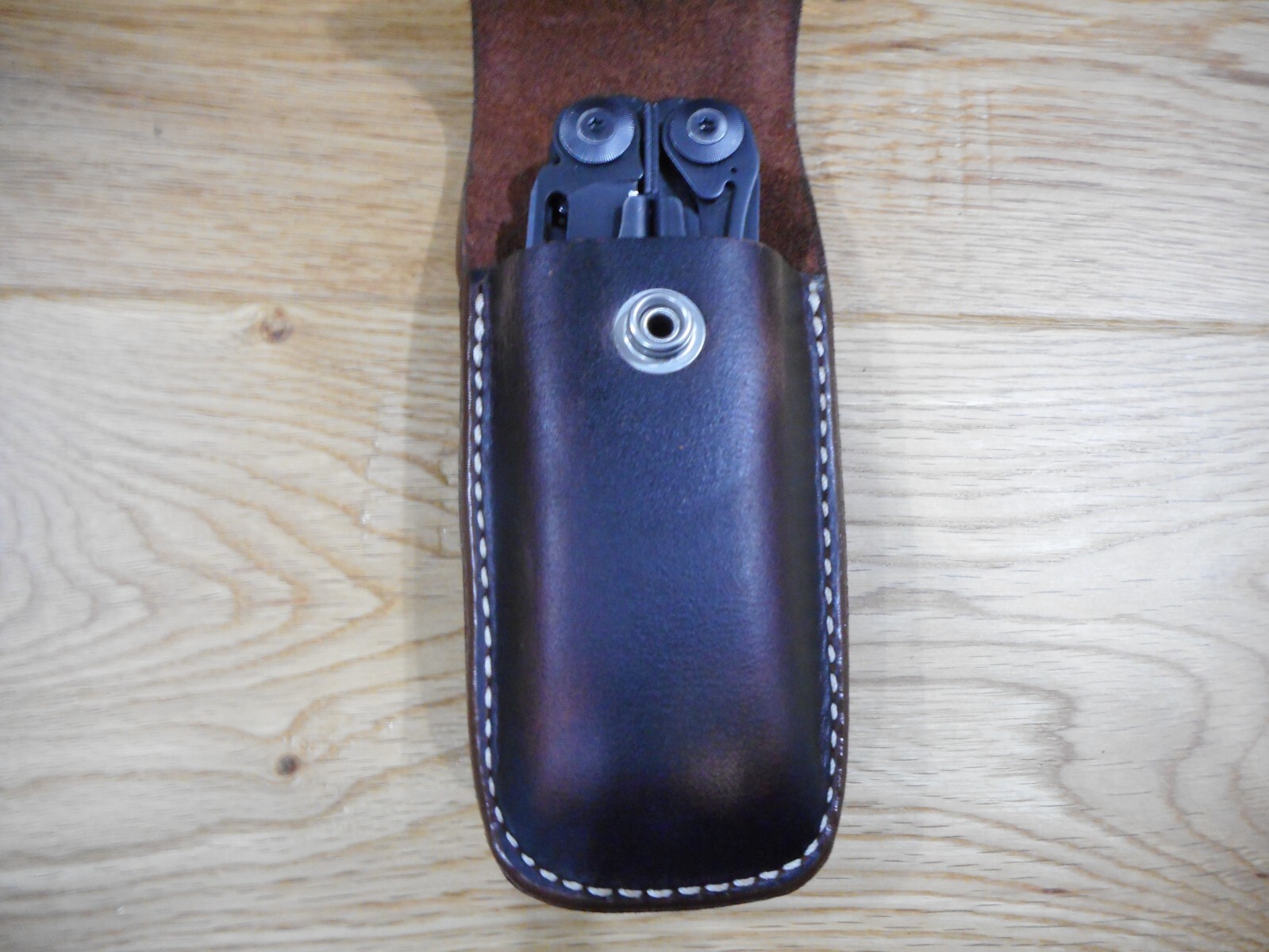 Leatherman Surge. Crazy Horse leather sheath. Tooled flap. Sheath only.