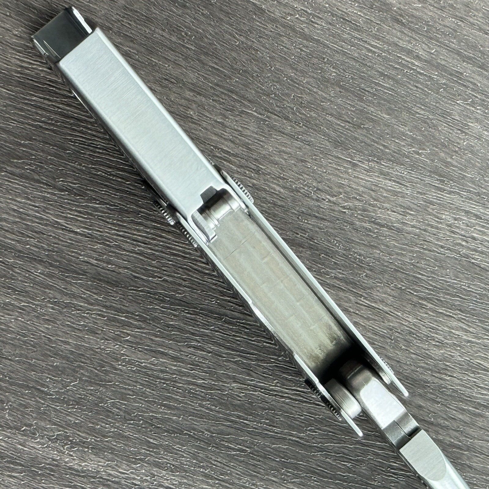 Leatherman MINI TOOL multitool. Variant w/US PAT 4744272 and a Blank side