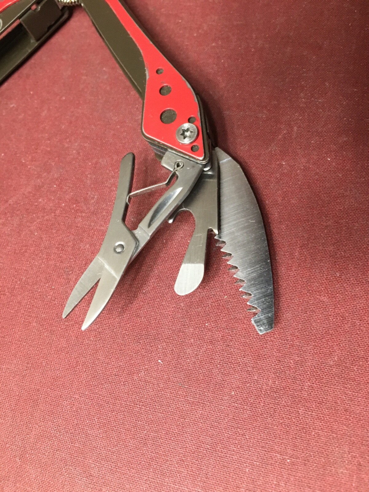 Cabela’s 4-1/2″ Multi-Tool in Red and Black with 7 Tools In One