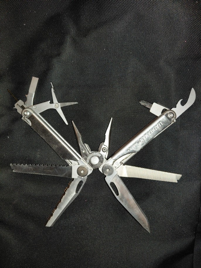 Leatherman BRAND NEW Wave Plus. Silver w/ Black Case. Factory oil still visible!