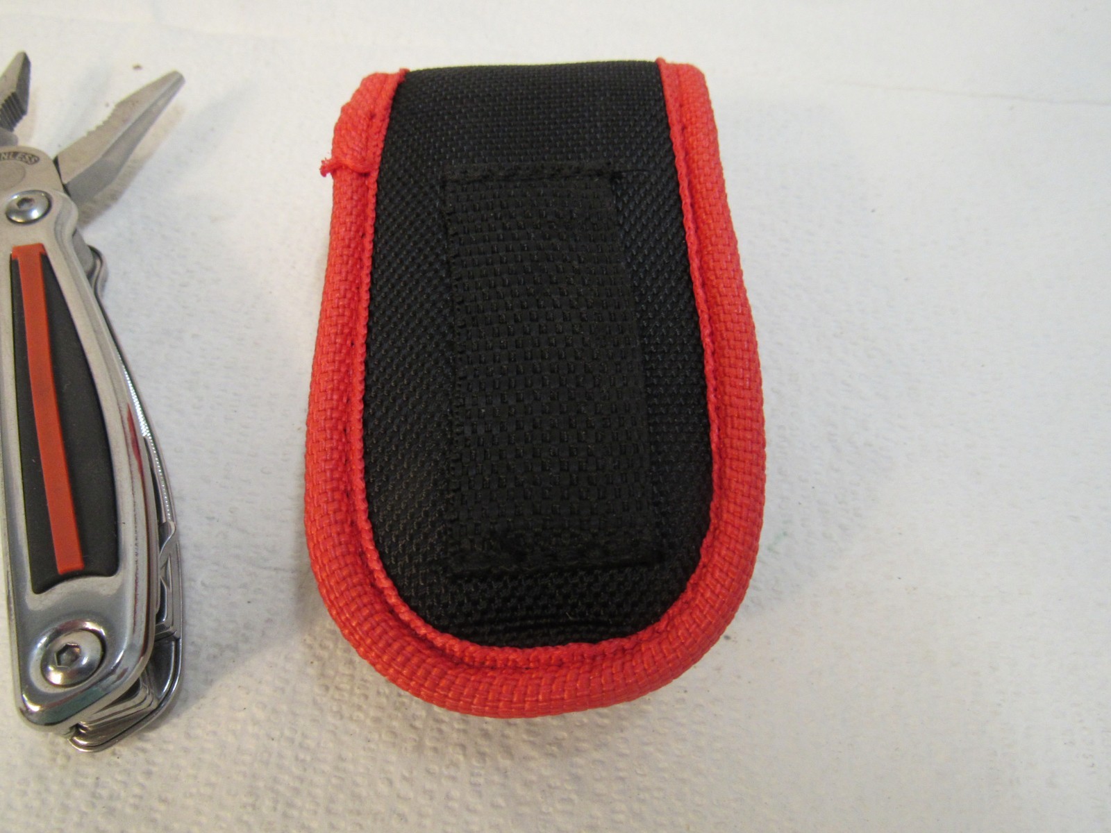 Radio Shack Multi-Tool Stainless Steel With Belt Case Red, Black, Stainless