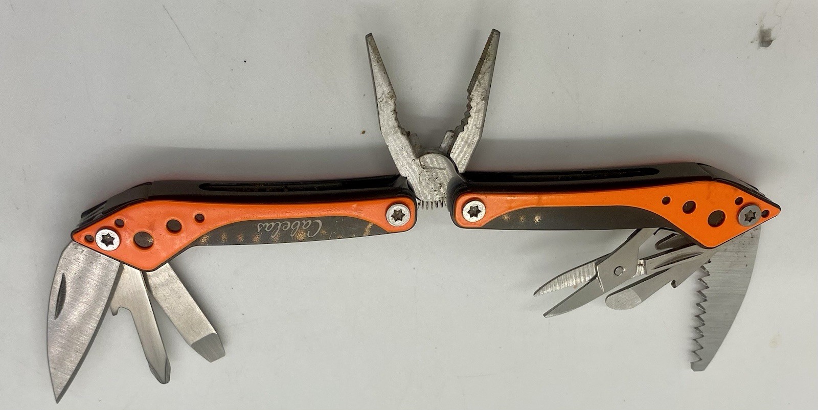 Cabela’s Multi-Tool 7 Tools in 1 Orange Knife Pliers Stainless Steel Black Case