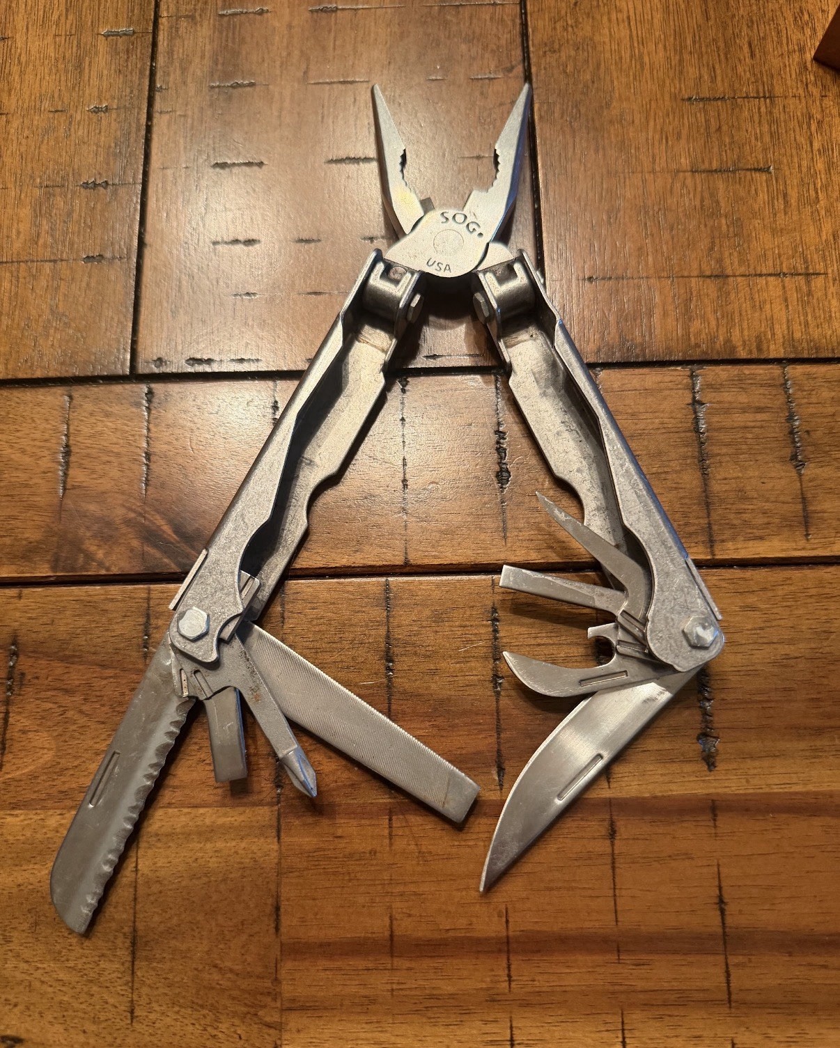 SOG Multi-Tool Stainless Steel Partially Serrated Blade Leather Sheath 7 Tools