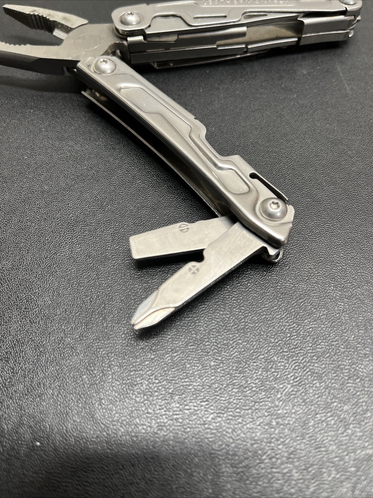 Leatherman Rev Pocket Size Carry-on Stainless Steel Multi-tool, & Engraved