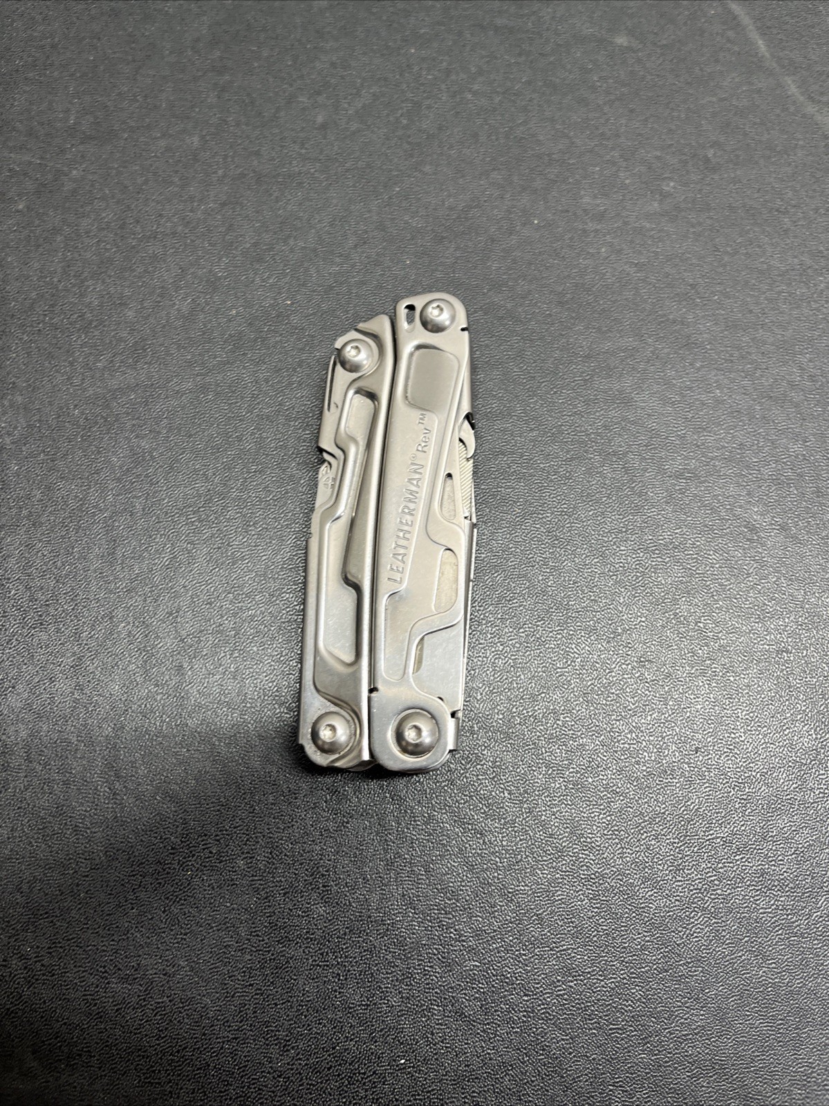 Leatherman Rev Pocket Size Carry-on Stainless Steel Multi-tool, & Engraved