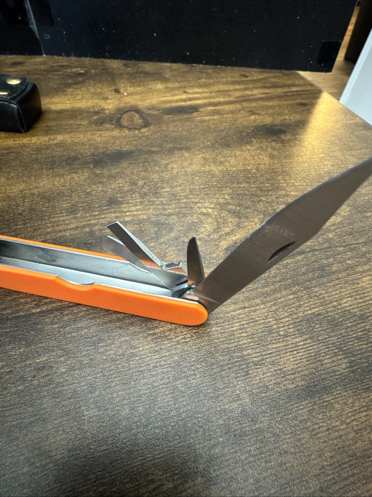 Orange Companion 10 in 1 Multi-Tool – Folding Pliers, Blades, Screwdrivers, Saw