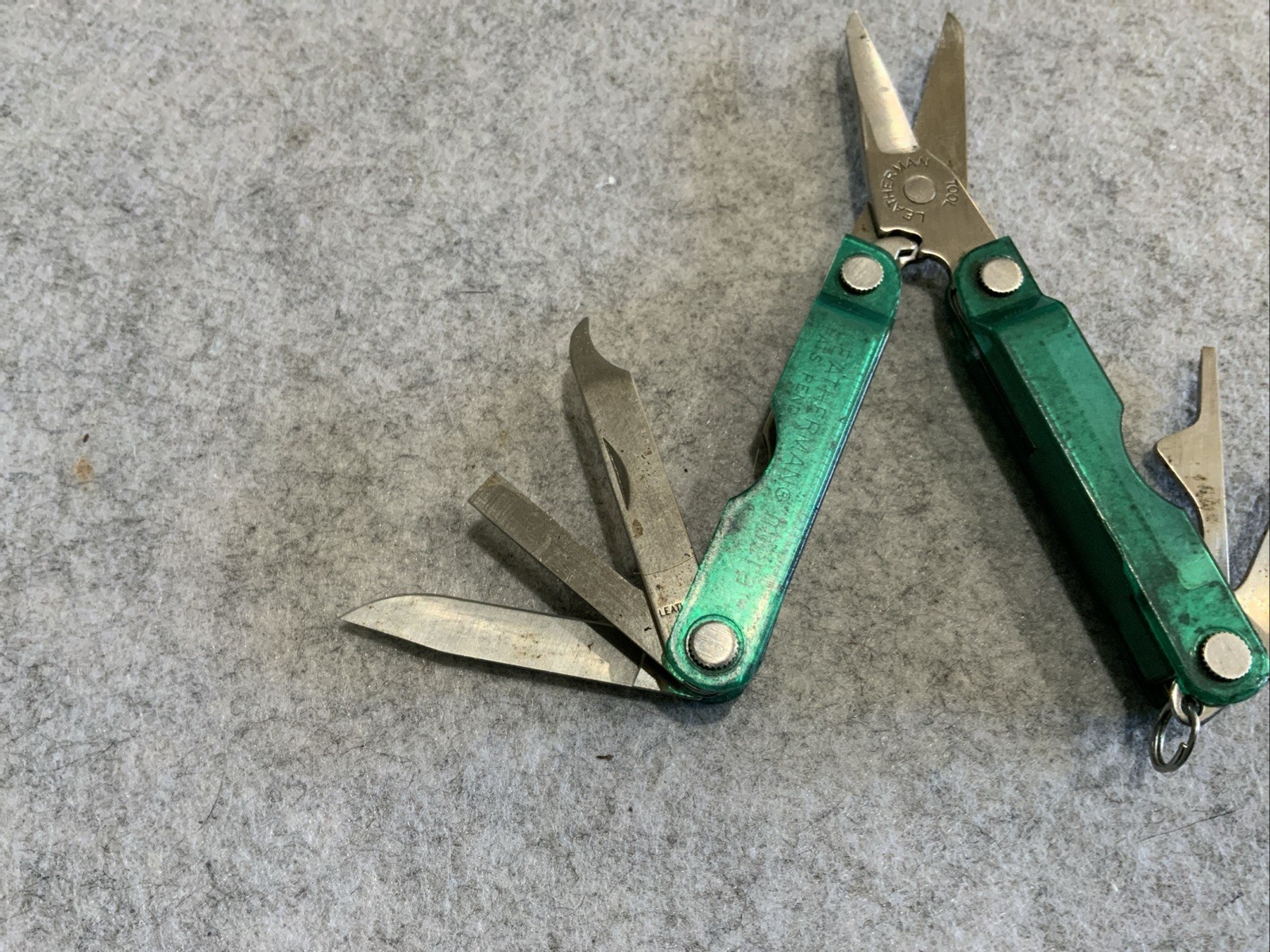 Leatherman Micra Multi Tool Green Transparent Plastic Coating Scissors Knife
