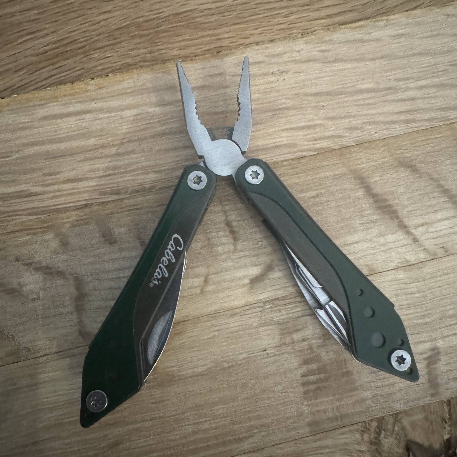 Cabela’s 7 Tool Multi-Tool with Sheath Spring Open Pliers Scissors Saw Green