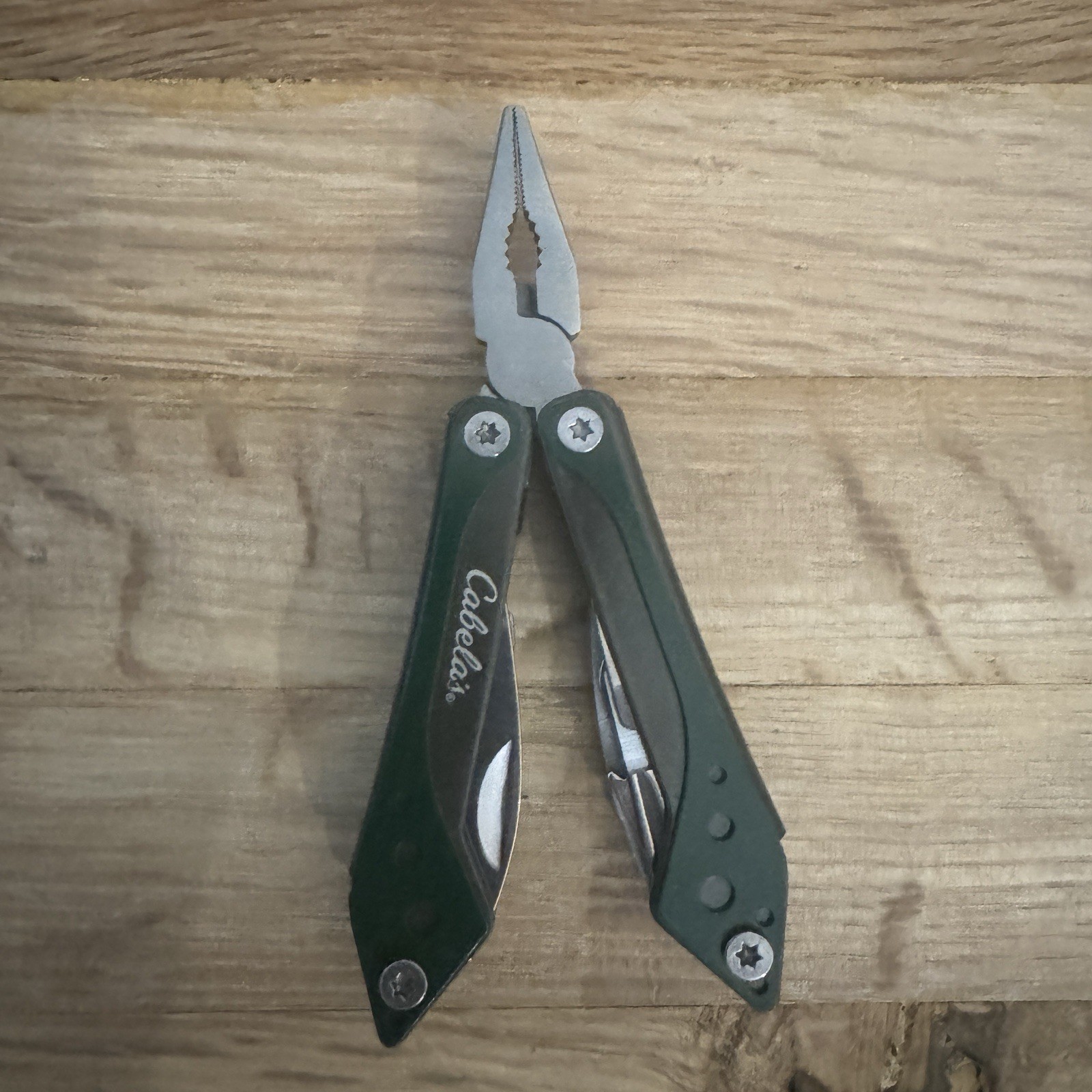 Cabela’s 7 Tool Multi-Tool with Sheath Spring Open Pliers Scissors Saw Green